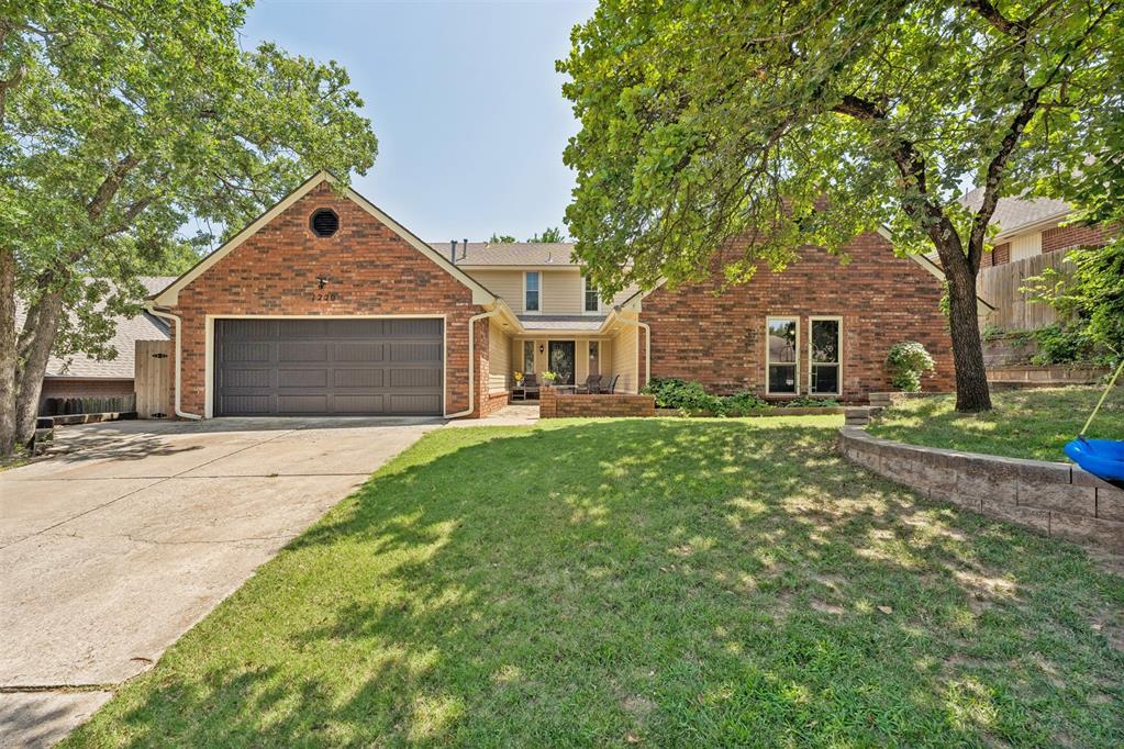 Rare true 5-bedroom, 3-bath home offering the highly sought-after convenience of three bedrooms on the main level. Upstairs, you'll find two additional bedrooms, a full bath and a versatile second living area. One upstairs bedroom features built-ins and could also serve as a home office, hobby room or flex space.The inviting living room showcases soaring vaulted ceilings with exposed beams and a floor-to-ceiling brick fireplace, creating a warm focal point for gathering with family and friends. The kitchen features granite countertops, an updated tile backsplash, abundant cabinetry and a casual dining area, while the formal dining room provides additional space for holidays and entertaining. The spacious primary suite offers generous storage with a large walk-in closet, separate linen closet and additional built-in cabinetry. Secondary bedrooms are generously sized with ample closet space. Enjoy the patio and spacious backyard, perfect for relaxing, entertaining or play. Additional features include built-ins throughout, a storm shelter, French drain, sprinkler system, smart thermostats, carpet and water heater replaced in 2024, and garage door replaced in 2025. Combining a highly functional floor plan, recent updates and versatile living spaces, this home is a standout opportunity.