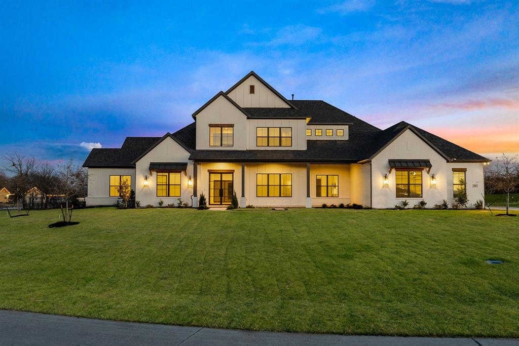 A striking, custom designed and built new construction estate that sets a new standard for refined living in Fairview. Crafted with intentional detail and elevated finishes, this residence blends luxury with livable design in a setting that feels both private and exclusive. The white brick exterior, neat landscaping, and side-entry four-car garage create instant curb appeal. Inside, soaring ceilings, wood flooring, and custom wall paneling frame expansive open-concept living spaces. The living room showcases an electric fireplace wrapped in black paneling and oversized sliding glass doors opening to the backyard. The chef’s kitchen delivers both beauty and performance with quartz countertops, a waterfall island with generous storage, built-in refrigerator, Thermador appliances, pot filler, custom cabinetry, and a thoughtfully designed coffee bar. A fully equipped prep kitchen with grocery drop door, additional appliances, and pantry enhances functionality for entertaining and everyday living. Purposeful spaces include a private study, wet bar with wine refrigerator, game and flex rooms with backyard access, bonus MIL suite, and a dedicated fitness-flex room. The primary suite offers vaulted ceilings, spa-inspired bath featuring a soaking tub, oversized multi-head glass shower, and an expansive walk-in closet with custom built-ins and a hidden safe room concealed behind a mirror. Upstairs features a spacious game room with built-in tech bar, balcony, and a Texas basement ideal for future expansion. Outdoor living is designed for relaxation and entertaining, featuring a covered patio, direct pool bath access, an expansive grassy yard spanning nearly one acre, and a private covered patio off the primary suite. Pool renderings are available. Set within an intimate, custom enclave of only 12 homes, this property offers rare privacy and community charm. Located less than one mile from Sam Rayburn Tollway, with convenient access to Fairview and Allen.