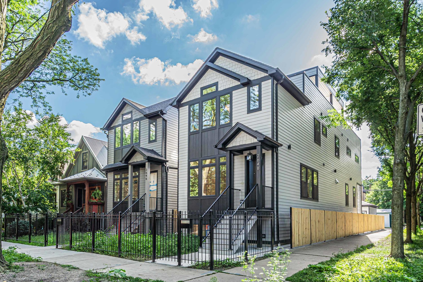 Corner location . Just completed new construction home In the heart of Logan Square.  6 bedrooms, 4.5 baths. Discover modern luxury in this exquisite new construction home. This architecturally refined residence blends elegance with functionality. Featuring a high ceilings, natural white oak wood flooring, custom cabinetry, high end Thermador proffesional series appliances, vine cellar, spa inspired baths and sauna. Private, covered roof top deck terraces with city views, exterior kitchen area.Smart home technology, high efficiency HVAC, radiant heat, premium lighting, prewired for sound system. Exterior 1st floor deck fenced yard, builder's warranty.