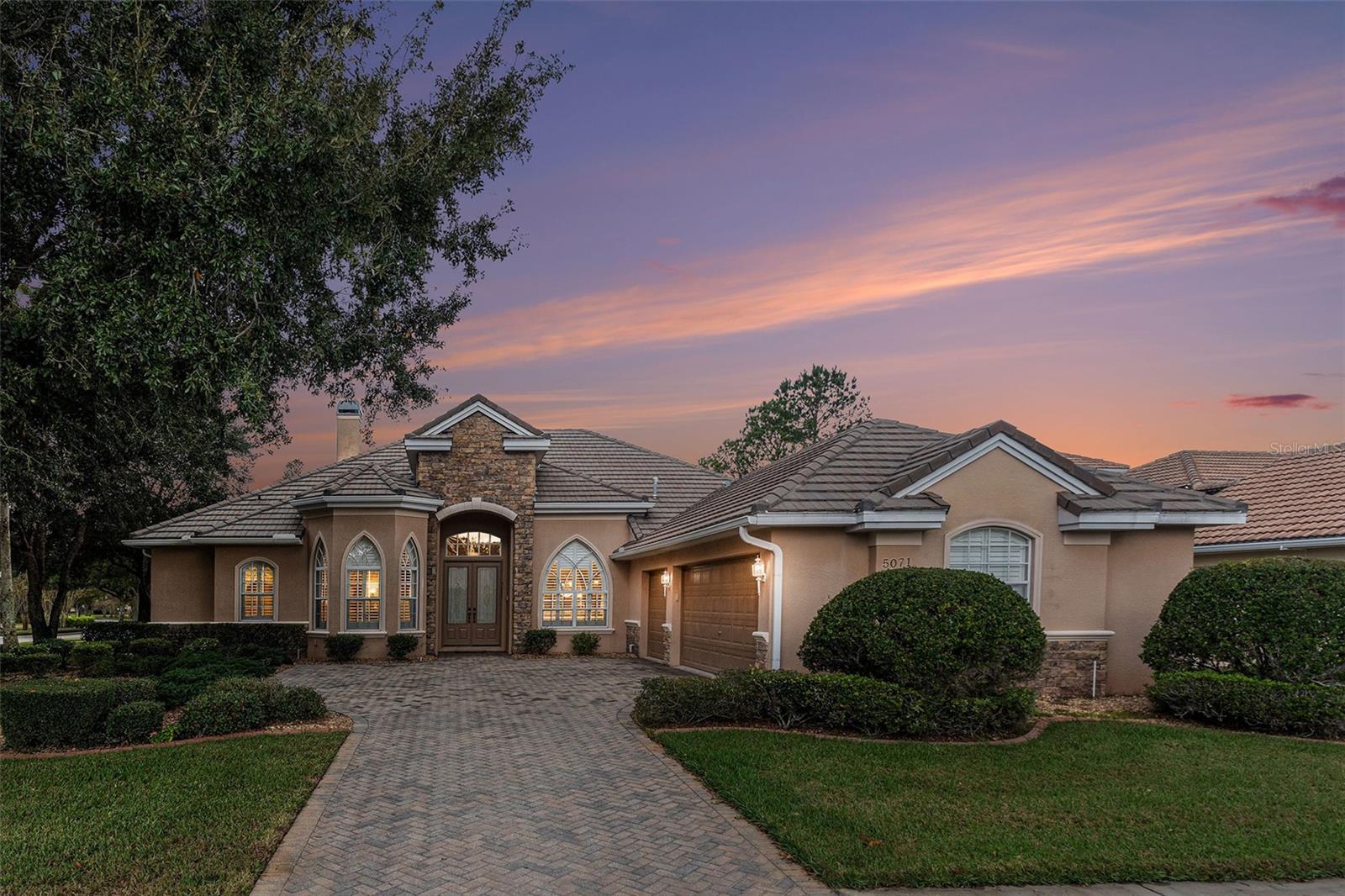 Under contract-accepting backup offers. Located within the prestigious gated community of Hernando Oaks Golf Club, this beautifully appointed former model pool home offers refined Florida living with sweeping golf course views. Perfectly positioned on a large corner homesite overlooking the fairways, the residence combines elegant design, quality craftsmanship, and luxurious upgrades throughout.This spacious 4-bedroom, 3-bath home was thoughtfully designed with both comfort and entertaining in mind. Rich upgraded wood flooring flows through the main living areas, complementing the open layout and abundant natural light. The kitchen has been tastefully upgraded with premium cabinetry, quality finishes, and generous workspace, creating an ideal setting for both everyday living and hosting guests. The home’s well-designed floor plan offers spacious living areas and private bedroom retreats, while large windows capture picturesque golf course views and bring the outdoors in. Situated on an expansive corner lot, the property provides added privacy along with beautiful curb appeal within this sought-after golf community. The community is also a gas community therefore appliances can be converted to gas. Residents of Hernando Oaks enjoy the security of a gated entrance along with the beauty of a championship golf course setting, all while being conveniently located near shopping, dining, and Florida’s stunning Gulf Coast.Experience the perfect blend of luxury, comfort, and scenic surroundings in this exceptional Hernando Oaks residence.