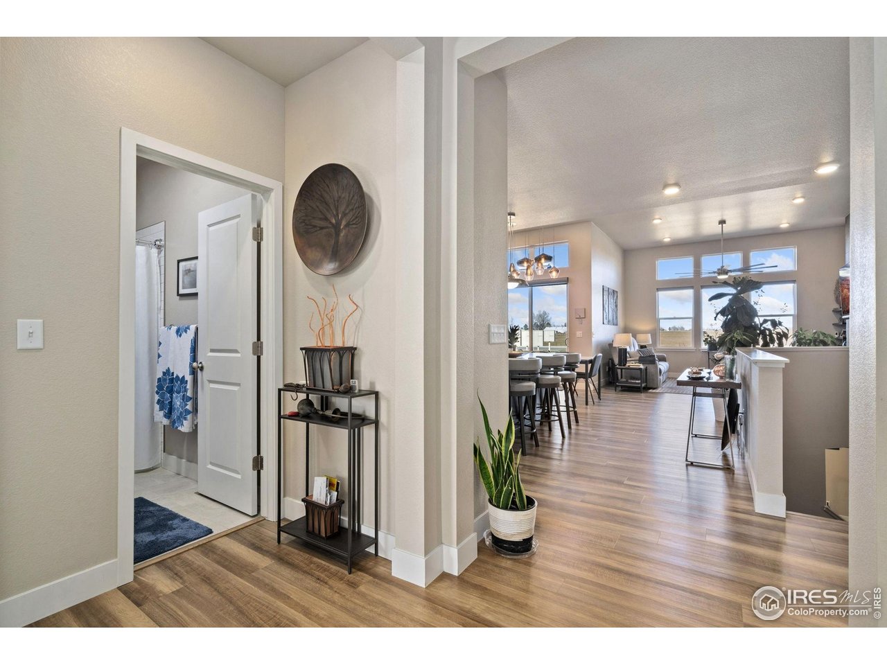 Here's your chance to own a charming 3-bed, 3-bath patio home complete with Tesla solar panels in Timnath's Wildwing! Built in 2020 with low-maintenance living-HOA covers lawn care, snow removal, and front yard upkeep. Enjoy a peaceful back patio with no neighbors behind you, an open-concept main level with soaring ceilings, and a warm, inviting kitchen with quartz countertops, stainless appliances, and a large center island. The primary suite features a spa-like shower and walk-in closet. Finished basement adds space for guests or hobbies. Community perks include Timnath Reservoir, pool, pickleball courts, and trails. 3-car tandem garage, close to Fort Collins, Loveland, and I-25.