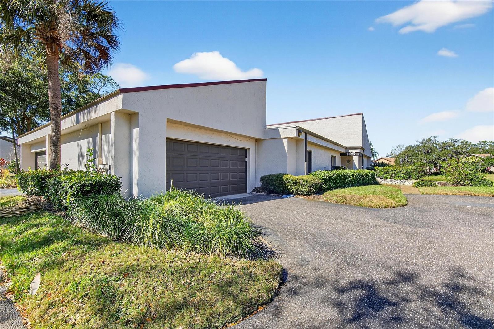 Walden Lake Fairway Villas. Beautiful 2-bedroom, 2-bath villa with a dedicated office or 3rd bedroom, offered furnished, and a 2-car garage overlooking a peaceful pond. The nicely remodeled kitchen features modern finishes and opens to the living and dining areas, creating a bright and comfortable space. Tile flooring throughout adds durability and easy maintenance. Enjoy added peace of mind with a 2024 metal roof and the reassurance that the property has experienced no flooding during hurricanes. Located in a quiet, well-maintained neighborhood with the community pool just a short walk away, this home is ideal for relaxed, low-maintenance living. A wonderful opportunity for full-time residents or seasonal owners seeking comfort, convenience, and tranquility. Call today for your personal tour.