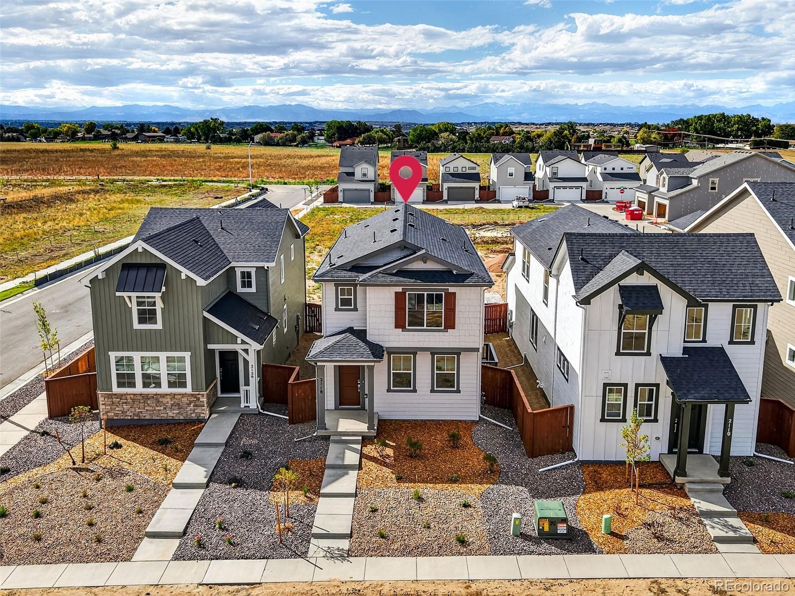 What's Special: Model Plan | East Facing Lot | Popular Plan.New Construction - Ready Now! Built by America's Most Trusted Homebuilder. Welcome to the Aurora at 2118 Wagon Wheel Aly in Farmlore. This is a fan-favorite floor plan that combines smart design with everyday comfort. Step inside and discover a bright, open-concept layout where the gathering room, dining area, and spacious kitchen with large island create a perfect flow for entertaining or relaxing. Step outside to the private patio and enjoy seamless indoor-outdoor living. Upstairs, the private primary suite is thoughtfully tucked away, while three secondary bedrooms with generous closets share a full bath with a separate water closet—ideal for sharing mirror time. A convenient upstairs laundry room keeps everything within reach, and the optional loft adds even more space to spread out. This lock-and-leave home features tall ceilings, large windows, and low-maintenance living. Set in Farmlore, a vibrant new community in Brighton, you’ll enjoy parks, a rec center with outdoor pool, and more than 11 miles of trails. With quick access to Prairie Center, Barr Lake State Park, and downtown Denver, Farmlore is where life feels wide open. Additional highlights include: air-conditioning, stainless-steel gas range, dual sink vanity at secondary bath, craftsman style railing and spindles at stairs. MLS#3602727