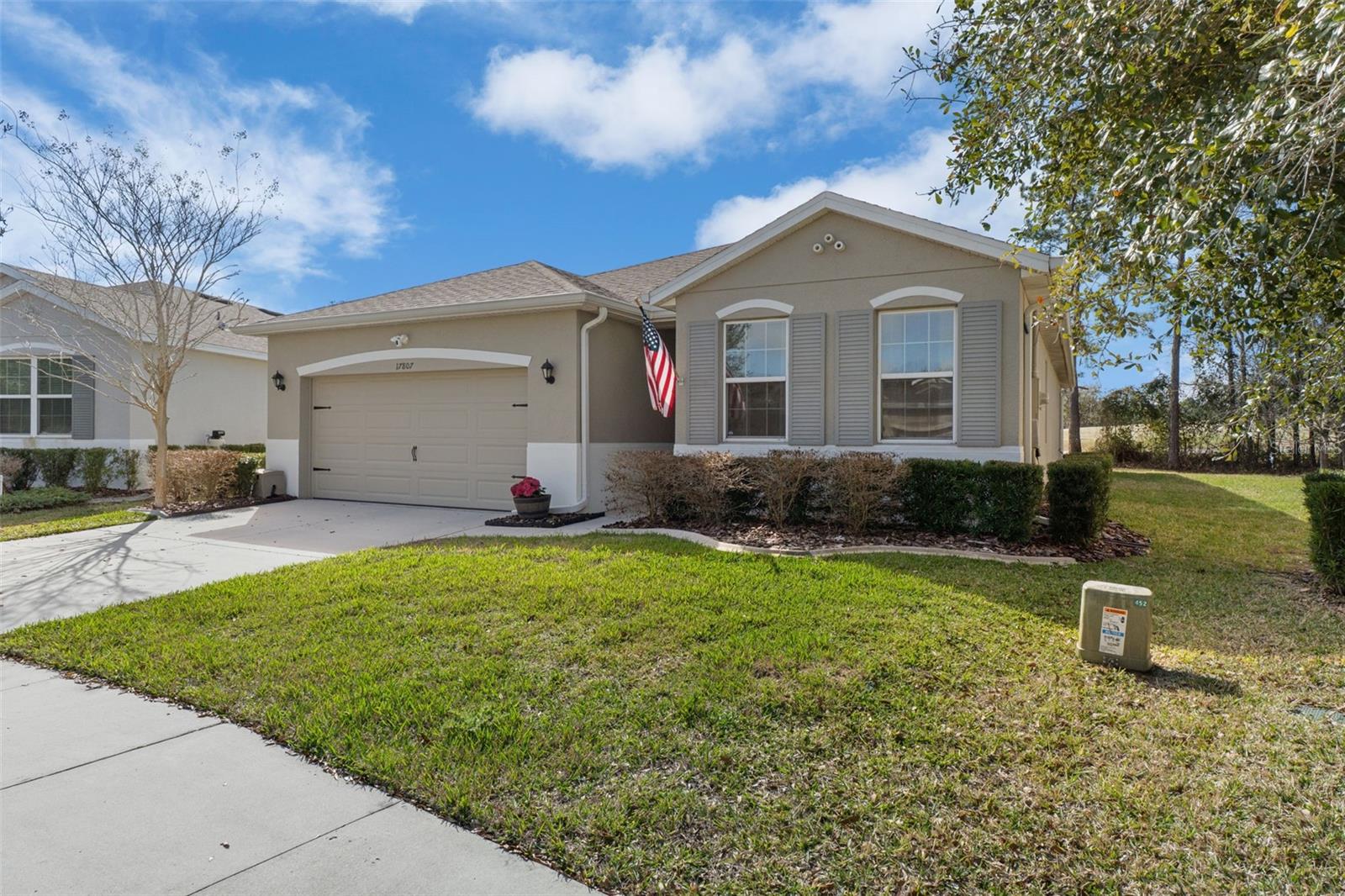 New pricing positioned to sell! Private, Low-Maintenance Florida lifestyle without the chaos of resort style communities. Tired of crowded communities and overpriced HOA amenities you’ll never use? Welcome to Hernando Oaks — where peaceful golf course living meets everyday convenience.This 2018-built 4-bedroom home offers a highly desirable 3-way split floor plan, giving everyone their own private space while still enjoying an open, connected living area perfect for entertaining. The updated kitchen features quartz countertops, white cabinetry, a pantry for extra storage, and a large center island ideal for casual dining or gathering with friends and family.Step outside to your covered lanai overlooking the golf course — no rear neighbors, just quiet mornings, evening sunsets, and room to create your own screened outdoor retreat.Inside, enjoy tile flooring in the main areas and luxury vinyl in all bedrooms for easy maintenance and durability. The spacious primary suite includes dual vanities, a walk-in shower, and generous storage.Located just minutes from shopping, dining, and only 6 minutes to the Suncoast Parkway for quick access to Tampa, this home offers the perfect balance of privacy, convenience, and value — without the high costs of amenity-heavy communities.If you’re looking for space, peace, and a move-in ready home in a golf setting, this is one you don’t want to miss. Quick close available.