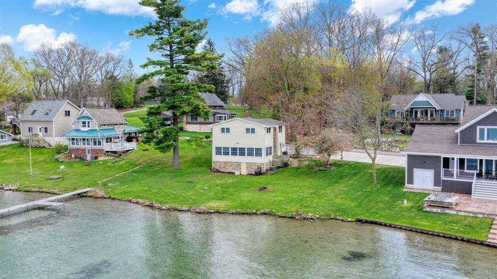 Welcome to 425 Oakwood Ave., Clarklake.  This beautiful 4 B/R, 2 Bath Lakefront home offers 83 Feet of frontage on desirable all sports Clark Lake. Fireplace in living room.  All appliances included. Walk out basement unfinished and great for storage.  Artesian well.  Located on the Spirit Trail, walking distance to Doyle's Market.  Tons of potential.  All furnishings negotiable.  Immediate possession.  Your summer fun awaits you now.  Listing agent is owner.