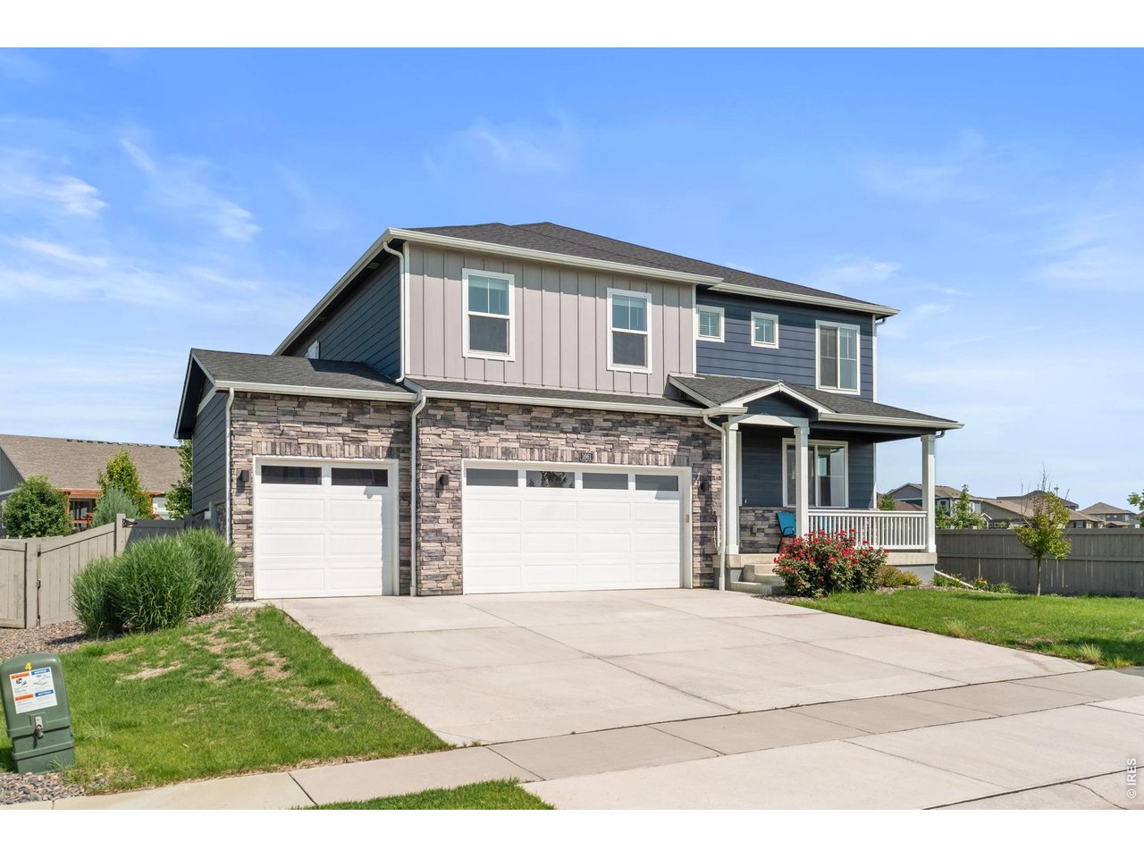 Stunning 2 story home in north Berthoud. This home looks like a model home, and you will think it's brand new. 5 generous sized bedrooms including a main level guest bedroom and 3 full bathrooms. The bright and inviting kitchen features stone countertops, a large island, and an abundance of painted cabinetry. Enjoy the modern design, thoughtful functionality, and exceptional value. Everything is done and ready to move in. The back yard is simply beyond words. The professional landscaping cost over $40k and a covered gigantic concrete patio with room for a fire pit, grilling, relaxation, etc. The backyard grass area is beautiful artificial turf ready to practice your golf game, and very low maintenance. And the border is beautiful stone with a gorgeous selection of plants, flowers, trees, etc. that do well in the Colorado weather. The full basement offers a large carpeted area with even more space for recreation, entertaining, hobbies, or a home gym. The exterior has full height stone on the front of the home, and additional stone on the entire perimeter of the home. Vantage community residents enjoy access to a neighborhood pool, splash pad, playgrounds, dog parks, and miles of trails, plus exclusive access to Heron Lakes TPC Colorado's resort-inspired pool, fitness center, and dining privileges. Walk to Berthoud Elementary, the Recreation Center, and Waggener Farm Park, and enjoy convenient access to I-25.