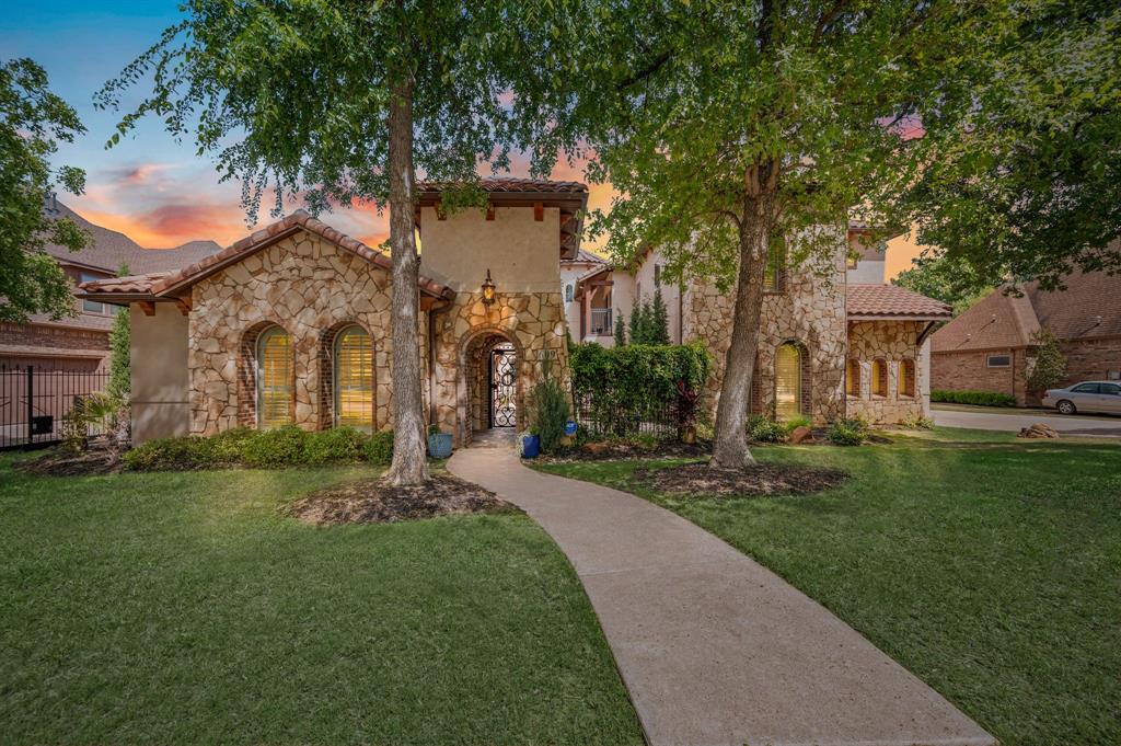 Experience refined luxury in this exquisite Tuscan-style home nestled in the prestigious Woodlands of Hidden Lakes. With 4 bedrooms, 3 full baths, and 2 half baths, this stunning residence blends comfort, privacy, and resort-style living. A gated courtyard welcomes you into a serene retreat, featuring a lagoon-style pool, raised spa, and a detached casita with full guest quarters and a private bath—perfect for visitors or a secluded home office. The beautifully updated kitchen is a chef’s dream, complete with a large center island, premium finishes, and seamless flow into a spacious living area adorned with soaring vaulted ceilings and rich wood beams. A first-floor media room offers the ideal setting for movie nights and entertaining. The luxurious owner’s suite provides a peaceful escape with dual walk-in closets, an oversized walk-in shower, and separate vanities for ultimate comfort. Upstairs, you'll find two additional bedrooms and a large gameroom—perfect for family fun or added living space. Step outside to enjoy the newly added outdoor kitchen and living area—an entertainer’s dream overlooking a tranquil greenbelt framed by mature trees. A spacious 3-car garage completes this exceptional property. Located in one of the area’s most sought-after communities, this home offers a rare opportunity to enjoy upscale living in a private, picturesque setting. Don’t miss your chance to experience it—schedule your showing today!