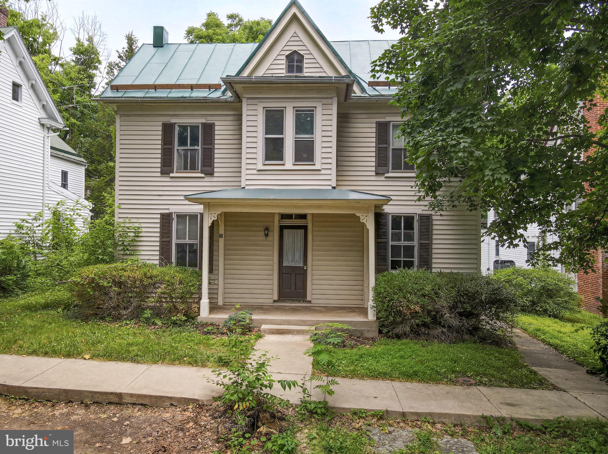 Charming home just outside of town limits.  Walking distance to downtown Shepherdstown with convenient access to local restaurants, shops, parks, and the University.  This residence features a welcoming atmosphere with spacious living areas, abundant natural light, and lots of character.  Enjoy outdoor living with a beautiful back yard and mature landscaping.  Close to commuter routes while maintaining the charm and tranquility of one of West Virginia's most sought-after historic communities.
