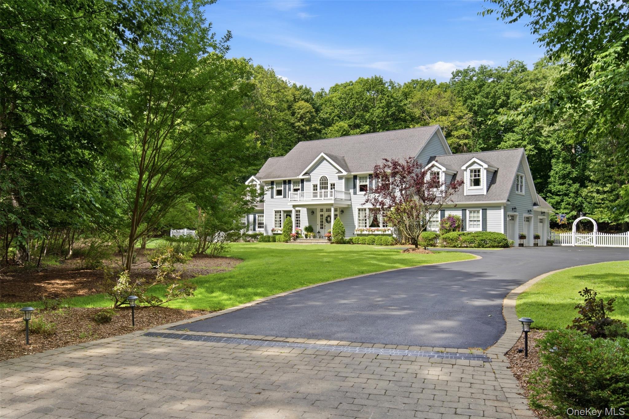 First time on the market!  Nestled on 2 flat, private acres within the coveted Lloyd Neck Estates Homeowners Association, this custom-built residence offers timeless elegance, exceptional versatility, and an unparalleled lifestyle.Designed with both comfort and sophistication in mind, this bright and spacious home features a traditional floor plan enhanced by high ceilings, custom moldings, raised paneling, oversized windows, beautiful hardwood floors, and a grand two-story foyer.  At the heart of the home is a beautifully appointed chef's kitchen featuring a large center island, gas cooking, stainless steel appliances, Cambria quartz countertops, dual pantries, and French doors that open to your backyard patio - perfect for entertaining and everyday living.  A rear staircase off the mudroom leads to an impressive second-floor recreation space, while the thoughtfully designed floor plan offers incredible flexibility.  The first floor primary suite can also serve as a private in-law suite, and additional living spaces upstairs provide options for a second primary suite or comfortable au pair accommodations.  The second level boasts two extraordinary oversized spaces, ideal as a recreation room, gym or home office.  One of the home's most remarkable features is its energy efficient geothermal heating and cooling system.  Utilizing renewable energy from beneath the earth's surface, this environmentally friendly technology provides year-round comfort with significantly reduced utility costs and eliminates the need for natural gas or heating oil.  Hardie plank and Azek construction an added bonus to this easy maintenance home! The sprawling grounds offer endless possibilities, including ample space for a pool, tennis court or sport court.  More than just a home, this property offers an exceptional lifestyle.  Enjoy access to your own private association beach, dock, and mooring, and as a Lloyd Harbor resident, enjoy the nearby Lloyd Harbor Village Park which includes summer camp programs, tennis, and additional beach and boating access.  Nature enthusiasts will appreciate the close proximity to Caumsett State Park and Target Rock Preserve, while residents also benefit from the highly regarded Cold Spring Harbor School District.  Additionally, Lloyd Harbor provides private Village police.  For the commuter, just a 55 minute train ride to Manhattan.  A rare opportunity to own an exceptional residence in one of Long Island's most desirable waterfront communities.  Come for a look on Sunday, June 26th 12:30-3pm