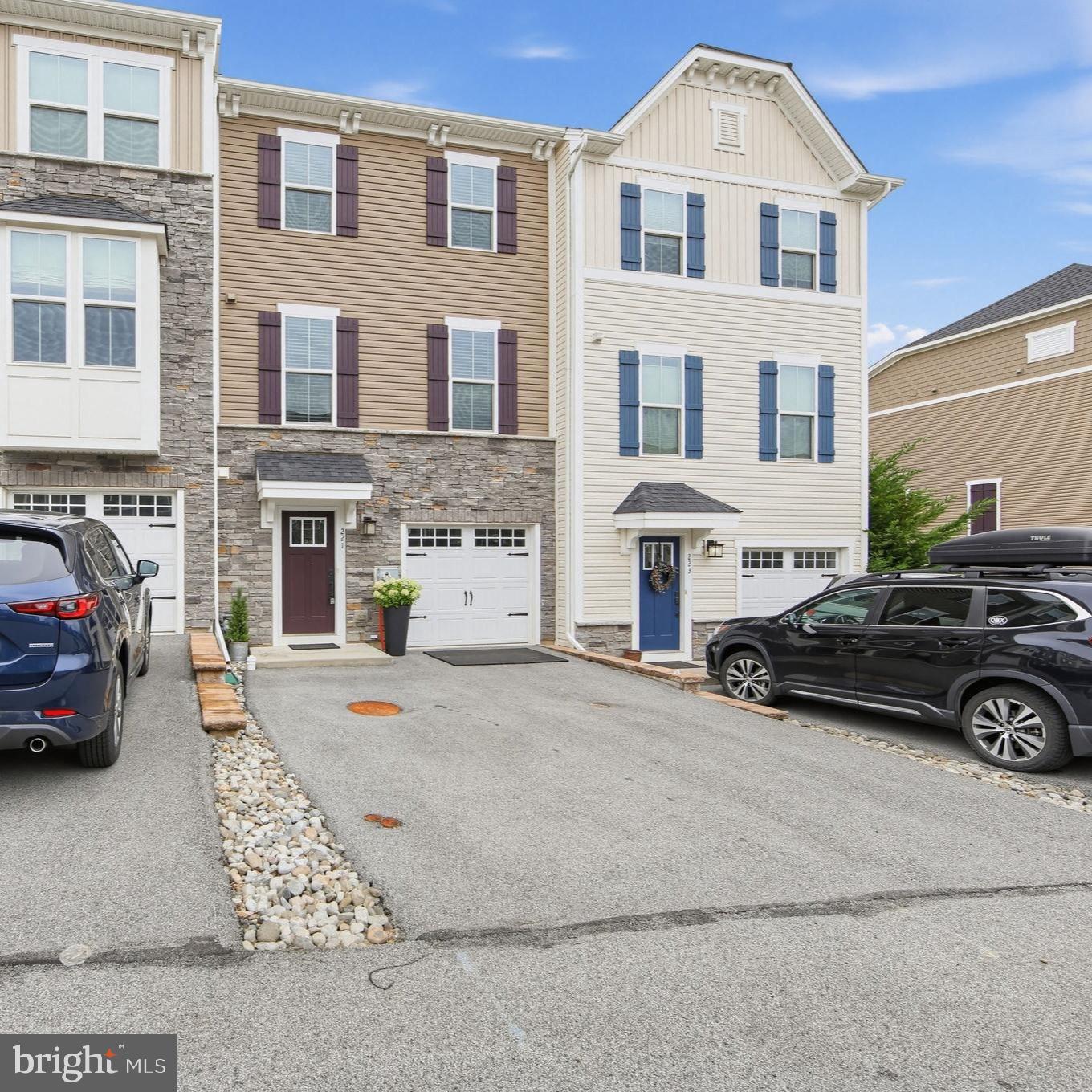 Why buy new when you can move right into this beautifully maintained, 5-year-young home in Downingtown School District? Truly move-in ready, this home offers three finished levels of flexible living space, the convenience of a bathroom on every level, and a bright, open floor plan.The entry level features a convenient half bath and a spacious living area with new carpeting and direct access to the backyard and garage. This versatile space offers endless possibilities and can easily serve as a family room, home office, gym, playroom, or rec room. Upstairs, the main living level is designed for both everyday living and entertaining. The fabulous kitchen is the heart of the home and features a large granite island with seating for up to four comfortably. The space surrounding the kitchen provides plenty of room for both dining and additional seating and leads directly to the large Trex deck overlooking open space and greenery. The kitchen flows seamlessly into the large living room and additional half bath.The upper level features a primary suite with tray ceilings, a walk-in closet, and an en-suite bath with a double vanity, glass-enclosed shower, and separate soaking tub. Two additional bedrooms, a hall bath, and a conveniently located laundry area complete this floor.Located within minutes from shopping, parks, walking trails, and major commuter routes. This home offers the space, location, and move-in-ready condition you have been looking for.