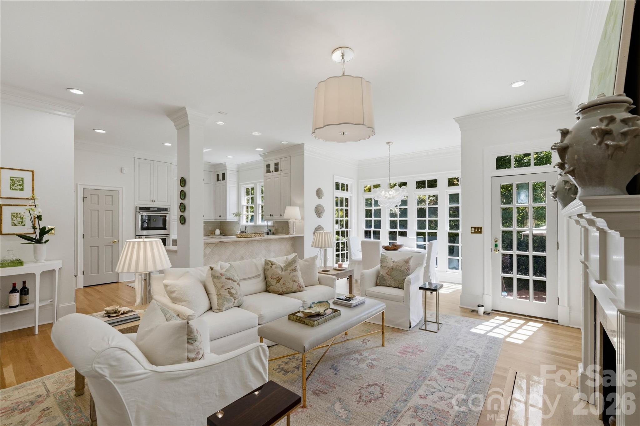 A rare opportunity in Carmel Crescent, one of Southpark’s most coveted residential communities. 2606 Sheffield Crescent Court stands apart with its private driveway and beautifully landscaped side yard shaded by mature trees, features found in only a select few homes within the neighborhood. This 3 bed, 2.5 bath all brick home has been extensively refreshed with whole house interior paint, newly refinished hardwood floors, new carpet upstairs, a new stair runner, and Visual Comfort lighting throughout. The foyer makes an immediate statement with a striking chandelier, while generous windows throughout the home fill the interiors with beautiful light. Recent improvements continue throughout this gorgeous, timeless home to include new landscaping in the courtyard and a new washer and dryer. Oversized attic offers extensive storage with the possibility of creating additional finished space. Just minutes from Southpark’s premier shopping, dining, and everyday conveniences.