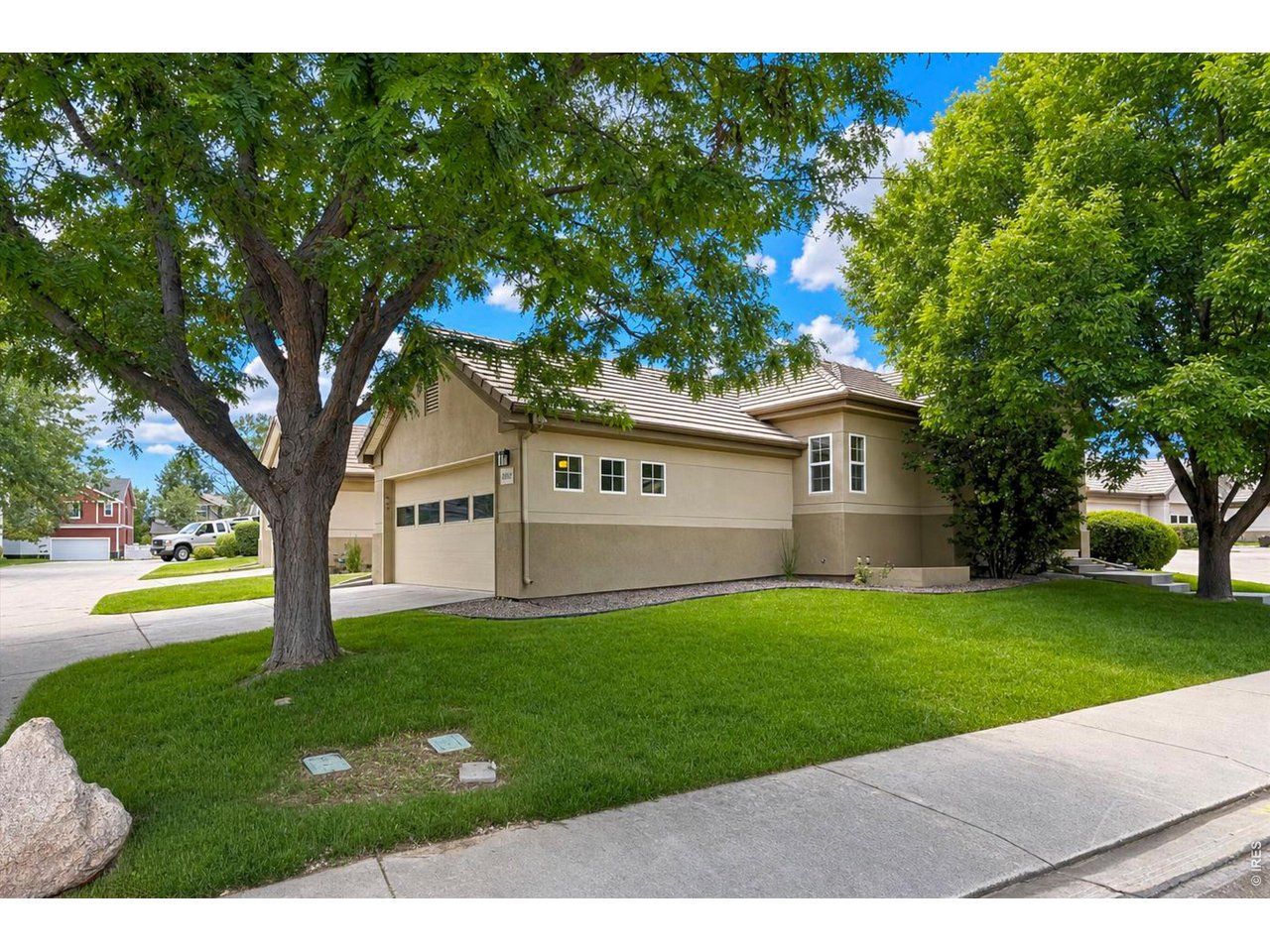 Delightful ranch end unit townhome is situated in the wonderful Renaissance Community of SW Longmont with easy access to the diagonal. Freshly painted with a neutral palette with new carpet throughout. This model features two bedrooms on the main level and two large bedrooms in the finished basement. Lovely kitchen offers ample cabinets and new stainless-steel appliances. Generous primary suite with new bath with large tile shower, LVP flooring, new double vanity and large walk-in closet. Living room features a gas fireplace and access to a spacious deck. Basement is finished with 2 large bedrooms and 3/4 bath with new LVP flooring. Very large family room with new carpet. Plenty of off-street parking plus 2 car garage. This home is truly a gem.