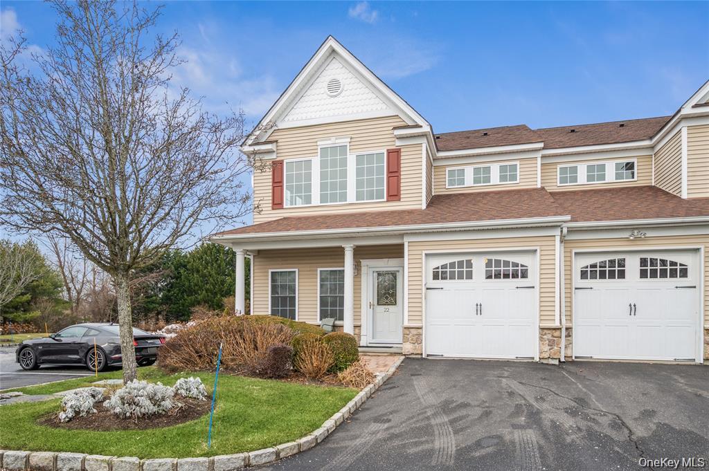 Desirable END UNIT beautifully maintained ,located in a desirable 55+ gated community in Locust Cove. Enjoy the convenience of an elevator with access from the basement to the second floor. This spacious home features a formal dining room, a warm and inviting family room with a gas fireplace, and eat-in kitchen with granite countertops and sliding doors leading to a private patio with awning -perfect for relaxing and entertaining. The primary bedroom offers a comfortable retreat with an en-suite bath, vanity, double sink, shower with built in seat  closets with organizers Additional highlights include wood floors, central air, attic stairs, laundry on the second floor, alarm, lots of basement storage and built ins, garage with entry to home and epoxy flooring, soft garage door. and abundant community amenities that enhance an easy, low maintenance lifestyle.