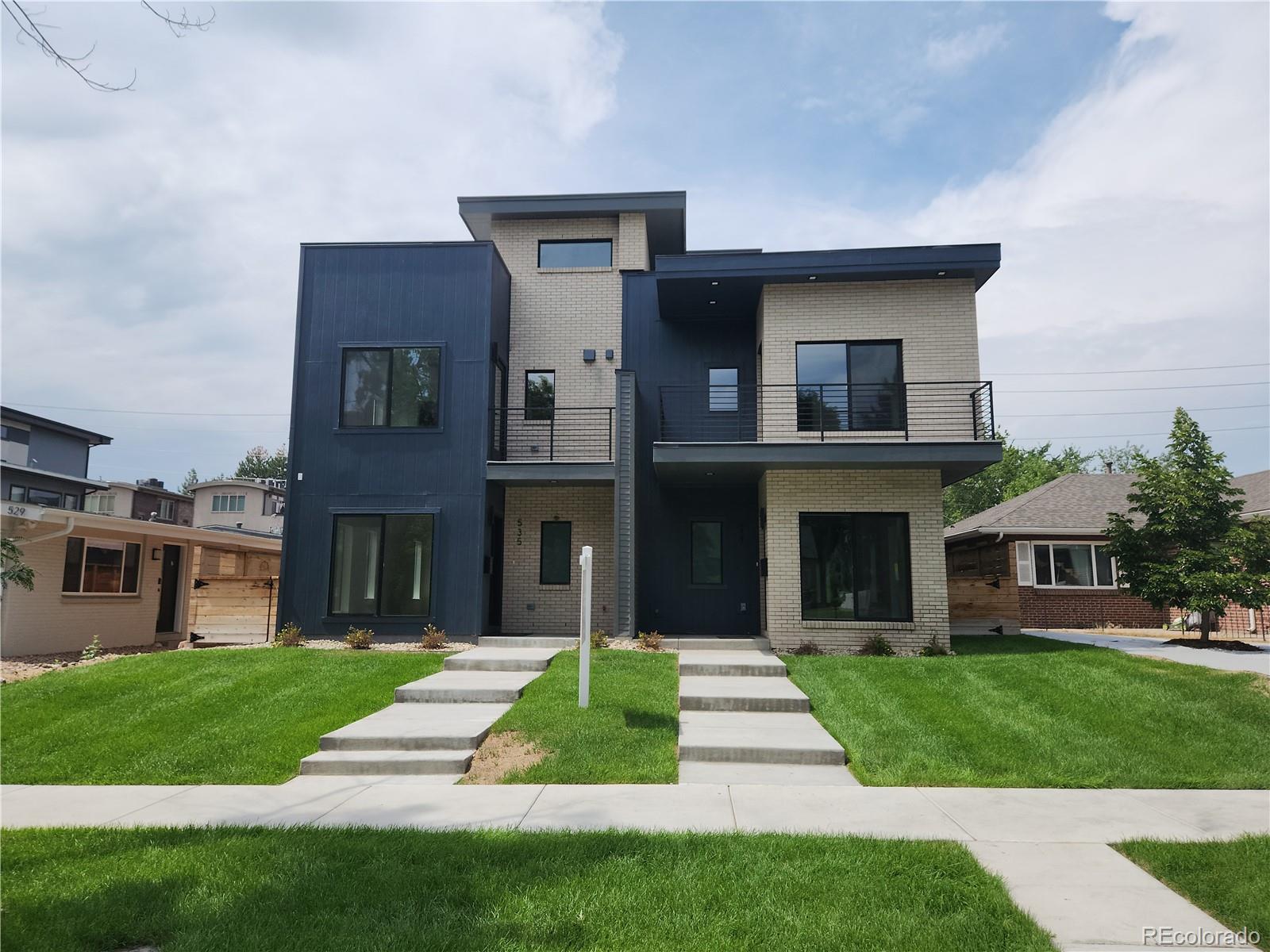 This newly constructed home by RedT Homes delivers a refined blend of modern architecture, elevated finishes, and effortless urban luxury. Spanning approximately 3,500 finished square feet, this 5-bedroom, 5-bath residence has been thoughtfully designed for those who value both sophistication and comfort. Clean contemporary lines, abundant natural light, high ceilings, wide-open living spaces, and rich wood, tile, and carpet finishes create an elegant yet livable atmosphere throughout.The main level is anchored by a gourmet kitchen featuring a dramatic waterfall quartz island, premium cabinetry, pantry storage, and chef-caliber appliances including a Wolf induction range and Sub-Zero refrigerator/freezer. The kitchen flows seamlessly into spacious dining and living areas, ideal for intimate evenings, elevated entertaining, or gathering with family and friends. Upstairs, the primary suite offers a private retreat with its own balcony, walk-in closet, and spa-inspired ensuite bath. Two additional upper-level bedrooms each enjoy ensuite bath access, while the upper laundry room includes a custom folding counter for everyday ease. A third-floor bonus space with wet bar opens to the rooftop deck, creating a showpiece setting for sunset cocktails, city views, and al fresco entertaining.The finished basement offers 2 conforming bedrooms, a full bath, and a generous family room suited for a media lounge, guest quarters, or private workspace. Outside, enjoy a private yard, patio, rooftop living, front and rear balconies.Set just moments from Cherry Creek’s celebrated boutiques, fine dining, art galleries, premier fitness studios, coffee shops, and the historic Denver Country Club, this home places the best of Denver at your doorstep. LEED Gold, ENERGY STAR, and Indoor AirPlus certifications further enhance the offering with efficiency, comfort, healthier indoor air, and long-term value—proof that true luxury should live as beautifully as it looks.