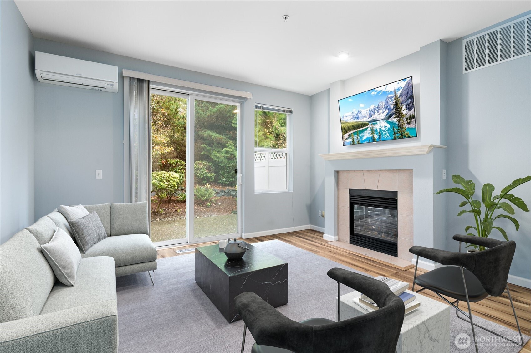 Welcome to Riverview at The Meadows, a gated townhome community offering comfort and convenience. This bright 2-bedroom, 2.5-bath home features soaring 9-ft ceilings and an open floor plan with abundant natural light. New flooring throughout. Cozy up by the gas fireplace or cook in the kitchen with center island, and gas range. Upstairs includes two primary suites, each with private baths. Enjoy your private patio surrounded by greenery, full-size W/D, and an attached tandem 2-car garage plus guest parking. Close to everything…light rail, Sounder, I-5 & 167. Minutes from SeaTac, Southcenter, Amazon fulfillment center, and Boeing. All appliances included!