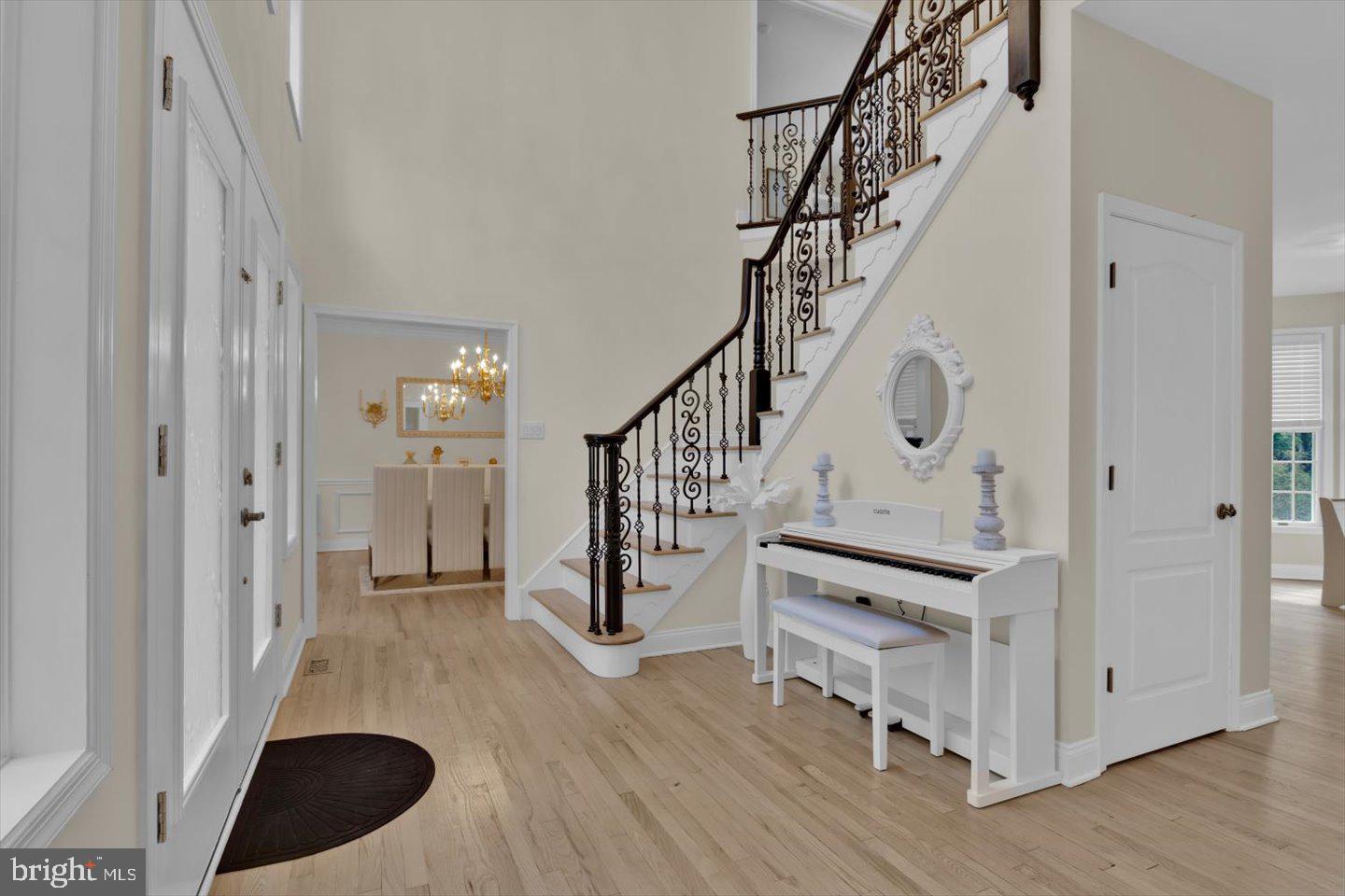 Exquisite 4BR, 3.5BA home in desirable Wellington Woods! Set on a private wooded lot, this residence features free & clear solar panels for a virtually free electric bill, plus a newer roof, HVAC. The gourmet kitchen shines with stainless steel appliances, granite counters, backsplash & updated cabinetry, flowing into the family room with a gas fireplace and access to the backyard. Harwood floors, newer plank flooring, neutral finishes throughout, and a private office with built-ins complete the main level. The luxury primary suite offers a spa-like bath, with 3 additional bedrooms providing ample space. A finished basement adds flexibility for a gym, media or rec room. Outdoors, enjoy brand new patio pavers, a custom fire pit and lush wooded backdrop. A 3-car side-entry garage completes this meticulously maintained home.