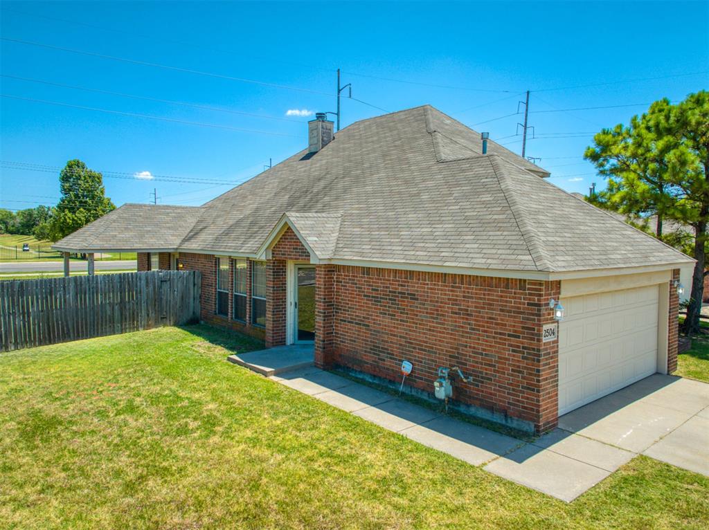 Come SEE this Beautiful and Spacuious 2 Story Home with  4 bedrooms, with 2 up and 2 down. Living Area with 20 foot ceilings has Open and Bright floor plan, with built-in brick corner fireplace with all of the ambience.  The kitchen has a large island surrounded by the stove, pantry and 2 door side by side refrigerator .Patio door is off of the kitchen that is accessiblre to the covered large patio
Downstairs is the large master bedroom with large walk in closet and double sinks.  Down the hall is the convenient of a washer and 
dryer hook ups. the second bedroom is downstairs opposite end of hall.  Large fenced in backyard.  Close to the Moore South High School.
