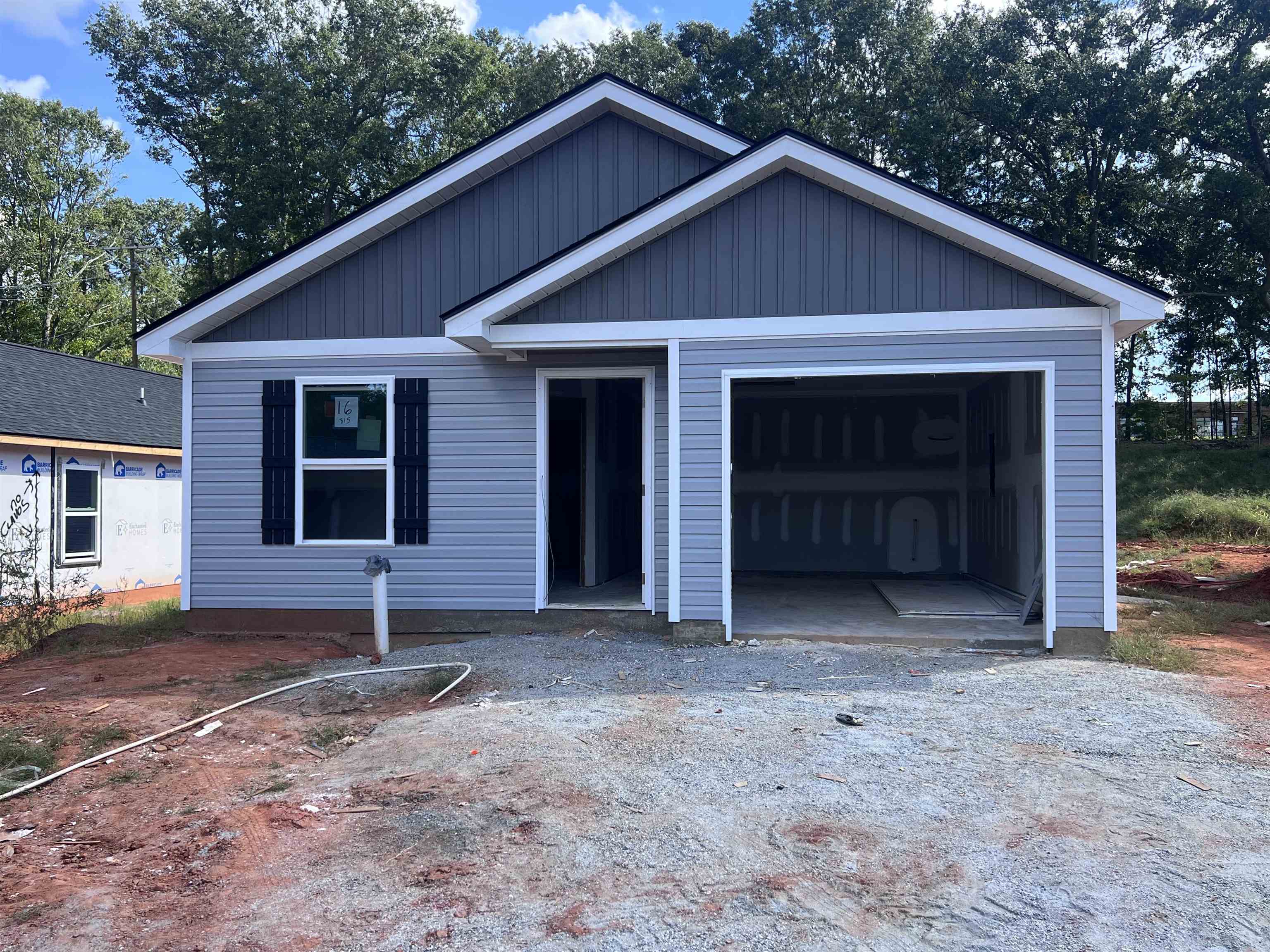 The Yale (Lot 16).  New construction home built by local builder in Spartanburg! The Yale Plan is a 3 bed 2 bath single story home offering 1308 sqft. Other features include Luxury vinyl plank flooring, fully sodded yard, covered patio, double vanity in master bath and more. 10 year warranty included with 30 year architectural roof. Built with quality craftsmanship, this new construction home combines comfort, efficiency, and value. Conveniently located in the Arcadia Village community with easy access to both interstate 85 and I-26, shopping, dining, schools, etc. Ask about $7500 builder incentive. Community will include playground and dog park. Must see!