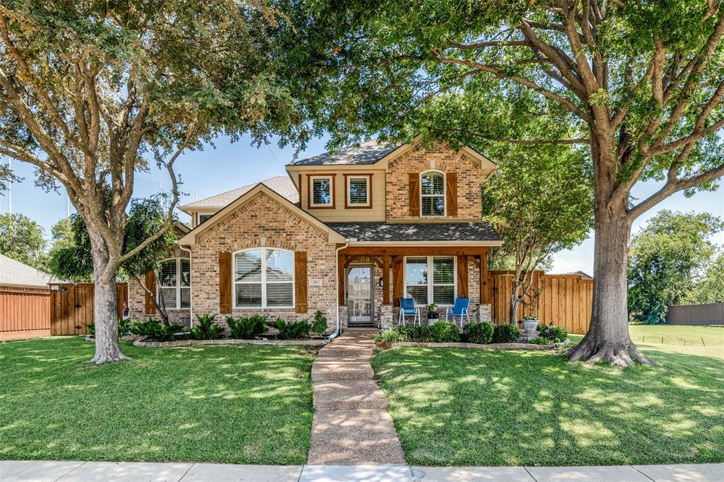 FANTASTIC! This beautifully maintained home blends classic charm with modern updates, offering 4 spacious bedrooms and an office (currently used as a 5th bedroom), plus versatile living spaces perfect for entertaining or relaxing. Step inside to find soaring ceilings, rich wood floors, triple-pane windows, plantation shutters, and abundant natural light throughout. The gourmet kitchen boasts quartz countertops, stainless steel appliances, wood-planked ceilings, and a large island that opens to a cozy family room with a fireplace. A standout feature is the heated and cooled sunroom with its own fireplace that's an ideal space for family game nights, entertaining guests, or simply unwinding in comfort year-round. Upstairs offers a game room, media room (currently used as a bedroom), and two additional bedrooms perfect for guests or growing families. The oversized garage is equipped with AC and extensive built-in storage for added functionality and convenience. Additional highlights include a whole-house generator, custom shutters, and a detached backyard workshop that's ideal for hobbies, projects, or extra storage. Enjoy outdoor living in the beautifully landscaped yard with an oversized patio. Behind the home is a scenic walking trail and pond, offering a serene and picturesque backdrop. With no adjacent neighbors, this unique lot provides rare privacy in a peaceful setting. Located in the highly desirable Spring Meadow community and within walking distance to the community park, top-rated Allen ISD schools, H-E-B, shopping, dining, and more this home truly has it all. Plus, with tons of thoughtful updates and features throughout, it's move-in ready and designed for modern living!