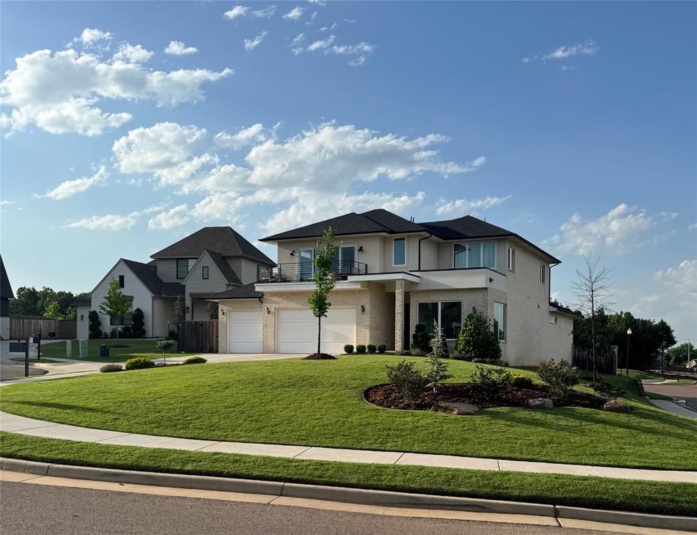 This beautiful modern coastal style home is situated on a corner lot in the sought after Cross Timbers neighborhood. With4 bedrooms, 4 baths, a spacious bonus room upstairs and balcony to enjoy the sunset, this 3,272 square foot home is a great blend of functionality and style. The open concept is perfect for entertaining. The kitchen features a 5-burner gas cooktop, built-in microwave, walk-in pantry, freestanding island, undercabinet lighting, and quartz countertops. Includes a whole house water softener and filtration system. Cross Timbers Neighborhood Amenities: Resort-style community pool. Fully equipped clubhouse and fitness center. Scenic walking trails and green space. Conveniently located near I-35and Covell, Cross Timbers offers a peaceful setting with easy access to shopping, dining, and all that East Edmond has to offer. **Lease to purchase option available.