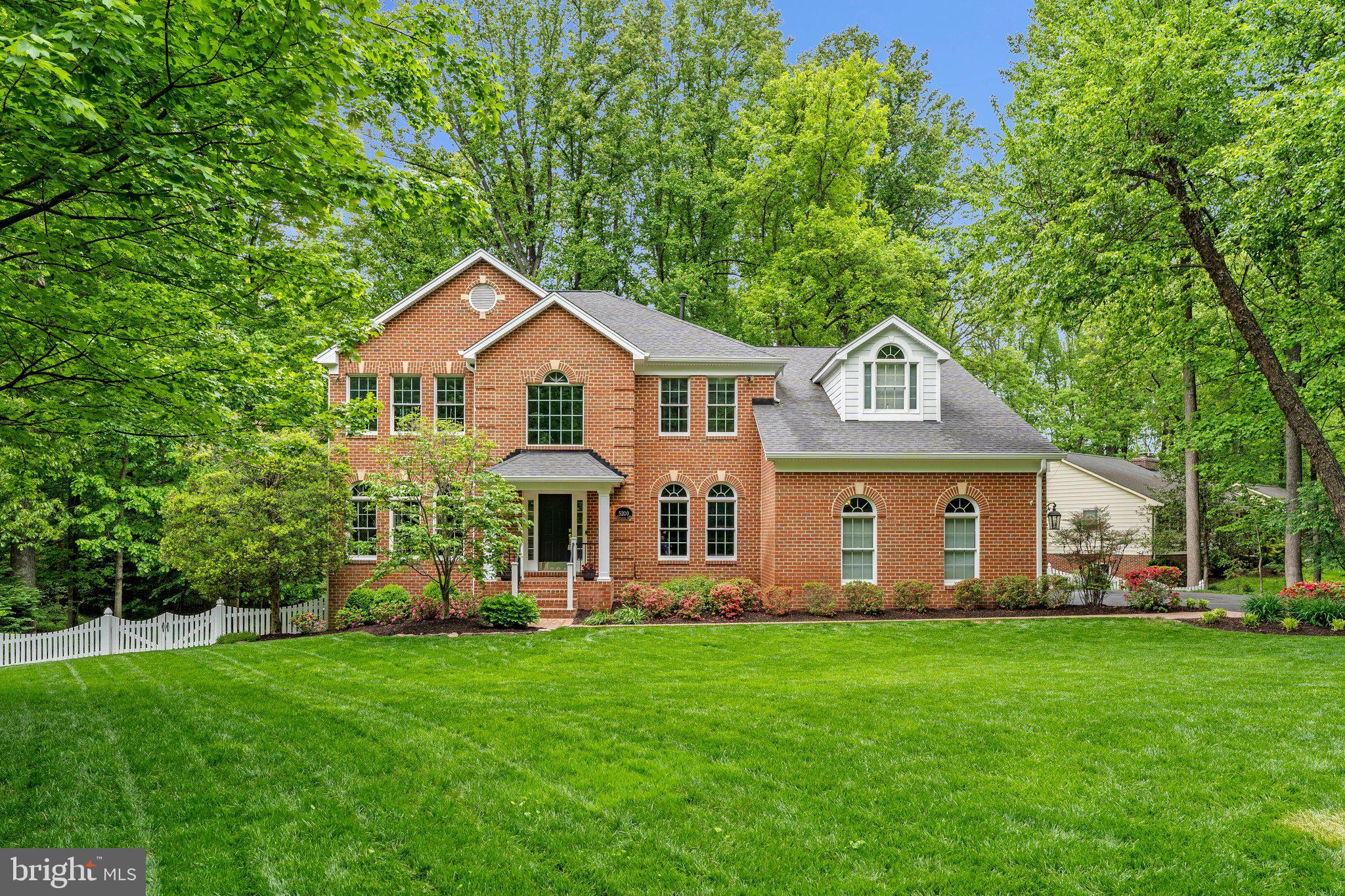 Stunning Dittmar custom-built, four-sided brick Colonial gracefully set on nearly one acre in one ofFairfax’s most prestigious enclaves. This sun-drenched residence offers exceptional craftsmanship,timeless design, and refined updates throughout. 3 Car Garage! Home Generator!A dramatic two-story foyer with soaring 17-foot ceilings sets the tone, complemented by newlydark walnut hardwoods and elegant formal living and dining spaces. The main level also featuresa private office, ideal for today’s work-from-home lifestyle.The chef’s kitchen is a true showpiece, featuring inset cabinetry, Taj Mahal quartzite countertops, aWolf range, and Sub-Zero refrigeration, all opening seamlessly to the inviting family room with awood-burning fireplace (gas conversion available). Designed for effortless indoor-outdoor living, steponto the expansive Trex screened-in porch—complete with heaters, fans, and a fireplace— 2nd part of Deck with built in Lynx gas grill creating ayear-round retreat perfect for entertaining or relaxing.Upstairs, you’ll find four spacious bedrooms, including a luxurious primary suite with a spa-inspiredbath, steam shower, and custom walk-in closet. A private princess suite with its own updated bath anda secondary staircase adds both convenience and charm.The walk-out lower level offers incredible versatility with two additional bedrooms, a full bath, and astunning wet bar featuring custom onyx backsplash, beverage cooler, ice maker, dishwasher, and winestorage—ideal for entertaining.Enjoy your own private, park-like setting on a beautifully landscaped .94-acre lot, partially fenced foradded privacy. Security Cameras installed along the back and front of the home as well as garage.Perfectly located just minutes from I-66, Fair Oaks, Wegmans, Costco, and Fairfax CountyParkway—this is truly a commuter’s dream. An exceptional offering that blends luxury, comfort, and location.