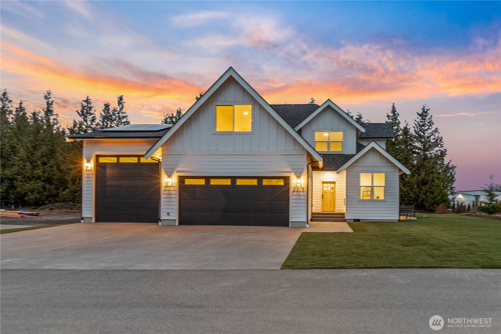 STUNNING new construction 4 bed, 3.5 bath home in the desirable Lynden School District was designed with luxury in mind! It features high-end finishes and a main floor primary ensuite complete with a complete with soaking tub and walk in closet. Large flex space downstairs is perfect for an additional living room, media/theater space or MIL with private access. Bonus room upstairs offers an optional 5th bedroom while still leaving a true office on the main floor.  The oversized garage provides ample room for vehicles, RV storage, or home gym. Built for comfort and sustainability with an electric vehicle charging station and solar energy system, this home blends elegance, efficiency, and modern living.  Minutes from golf! Opportunity awaits!