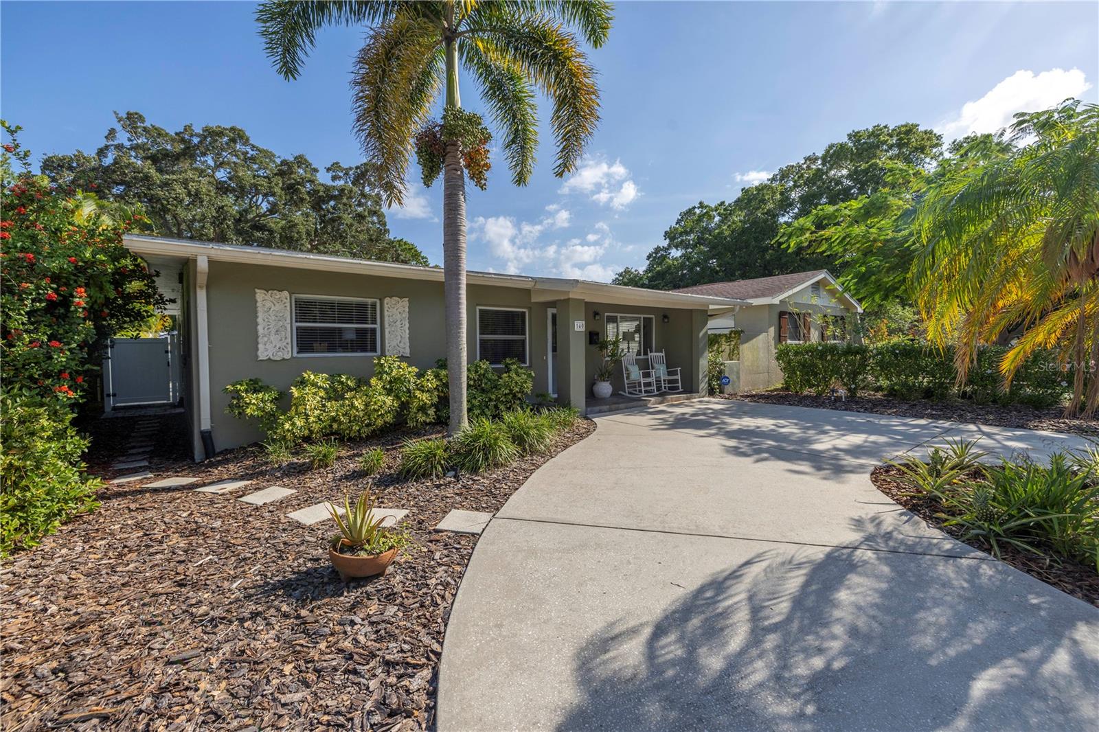 Modern coastal meets effortless entertaining. With an open floor plan and a backyard designed for year-round lounging, this Coffee Pot Park gem is ready for its next owner. **HOME HAS NEVER FLOODED**. Renovated in 2022 and located in the heart of NE St. Pete! Step into this 3 bedroom, 2.5 bath, pool home in the highly sought after Coffee Pot Park neighborhood. The open floor plan with updated kitchen is inviting from the moment you step in the door. The natural wood luxury vinyl floors and soft coastal colors create a large modern space. The recently updated kitchen is bright and airy with recessed lighting, quartz countertops, stainless steel appliances and well appointed island. There is a half bath just off the kitchen and close to the pool. This home has a split floor plan with 2 bedrooms and full bath off the main living area, leaving the Primary at the back of the home for a tranquil retreat. The primary is set off the main living area offering more privacy than a standard split floor plan. It is large with an ensuite bathroom and walk-in closet. The french doors from the primary lead to the cover patio and pool deck. The backyard is a personal oasis, great for entertaining or just enjoying your own slice of paradise with a covered paver patio and open pool deck (renovated 2020), pool (resurfaced 2020). Enjoy the low maintenance turf grass (installed 2023) out back and the lush landscape in front with the circle drive. This home is just steps to the waterfront Coffee Pot Park, public boat ramp and kayak launch for a water enthusiast's dream and miles of sidewalk along the waterfront leading to Tampa Bay and downtown St Petersburg. The location is within minutes to shopping, food, gyms and multiple parks. Centrally located to multiple schools - private, religious & public. Just miles from golf courses, museums, beaches, live entertainment and more. Approx. 8 mins to I-275, and approx 20 minutes to airports and the sandy gulf beaches. Don't miss this opportunity, schedule your tour today.