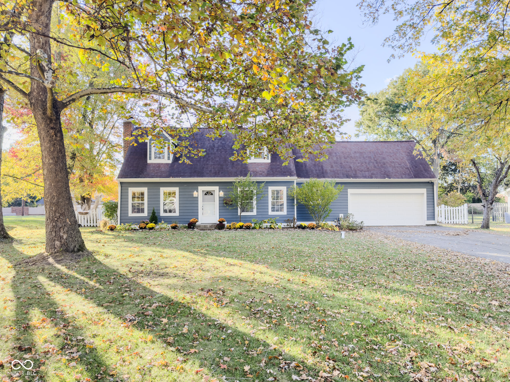 Beautifully Renovated Home on a Wooded Lot with No HOA!    Welcome to 9802 Hamilton Hills Lane in the heart of Fishers, where modern updates meet privacy and freedom. This beautifully renovated two-story home sits on an almost half-acre wooded lot with no HOA, offering rare space and flexibility in one of Hamilton County's most desirable areas. Fresh renovations blend style and comfort, featuring a bright, open layout ideal for relaxing or entertaining.    Step outside to your fully fenced backyard, complete with a classic white picket fence and a storage shed, perfect for lawn tools, hobbies, or extra storage. The large .45 acre lot offers endless possibilities for outdoor living, gardening, or simply enjoying the wooded surroundings.    Located minutes from Hamilton Southeastern schools, parks, shopping, and dining, this home delivers the best of Fishers living with no extra restrictions or fees.    9802 Hamilton Hills Lane offers the peace of a private lot, the benefits of a full renovation, and the freedom of no HOA, move-in ready and waiting for you to call it home.
