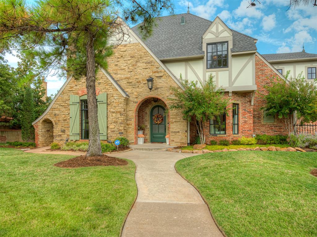 Experience refined living at its finest in this impeccably maintained, beautifully designed home conveniently located in the Turtle Creek Estates gated community. Perfectly positioned on a corner lot with lush landscaping and a serene lake view, this residence offers both elegance and privacy in a truly central location.

Spanning just under 4,500 square feet, this stunning property features 4 bedrooms, 3.5 baths, and an array of exceptional living spaces. Step inside to soaring high ceilings, abundant natural light, and exquisite custom woodwork throughout.

The main level hosts a luxurious primary suite with a spa-like bath, fireplace, and private patio access, while the three additional bedrooms upstairs offer comfort and style for family or guests. Enjoy entertaining in the media room with a wet bar, or work in luxury in the large study—a breathtaking office retreat with expansive windows and its own fireplace.

Designed for both relaxation and entertaining, this home’s outdoor spaces are unmatched. Four private patios surround the home. The custom swimming pool, as well as a waterfall and stream leading to the lake behind, are complemented by an outdoor kitchen perfect for hosting gatherings under the Oklahoma sky.

The gourmet kitchen boasts high-end appliances and a thoughtful layout for both cooking and entertaining. With four fireplaces, a three-car garage, and refined attention to detail throughout, every inch of this home exudes quality and craftsmanship.

This exceptional property blends timeless design with modern luxury—offering an unparalleled lifestyle to be enjoyed in every season of life!