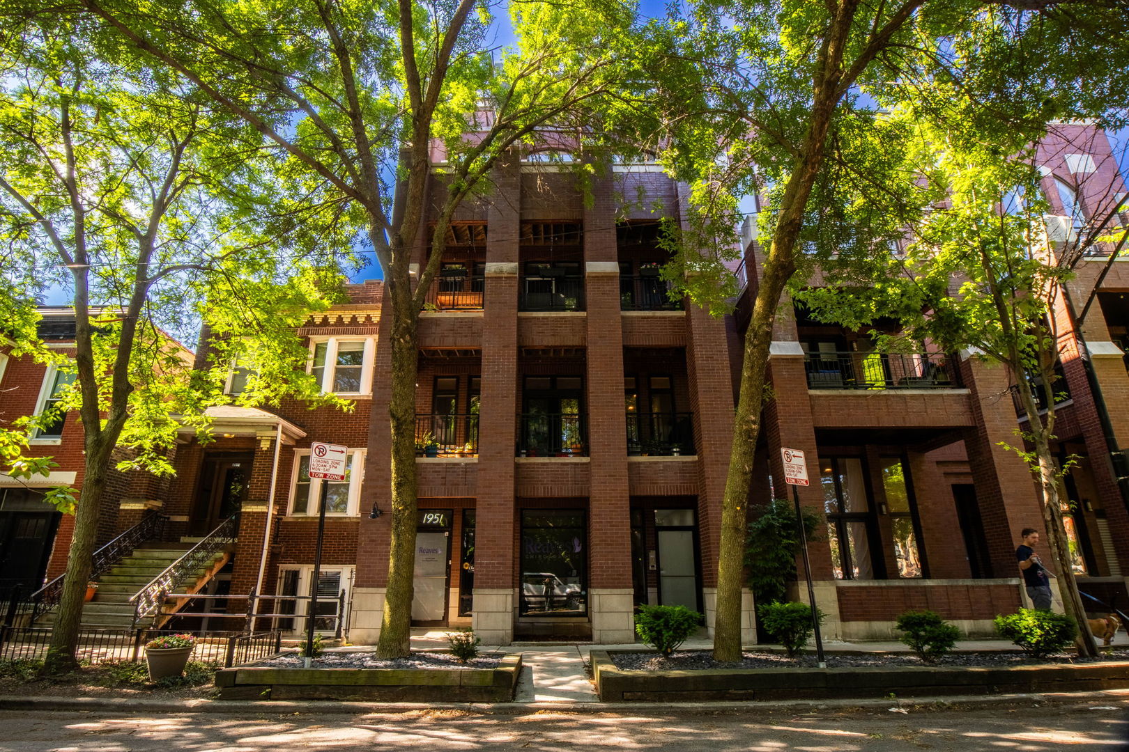 Absolutely stunning nearly 1,900 sq. ft. penthouse condo in the heart of Bucktown! Step inside to a dramatic 22-foot wide living room with custom built-ins that open to a spacious front balcony-perfect for relaxing or entertaining. The large dining area easily accommodates a full-size table, while the chef's kitchen shines with a custom backsplash, high-end stainless steel appliances, and an oversized peninsula ideal for both meal prep and casual dining. This home offers three generously sized bedrooms, including a luxurious primary suite with a spa-inspired bathroom featuring a walk-in steam shower, dual vanities, and a massive custom walk-in closet. Two additional bedrooms come complete with built-in closets, plus an in-unit side-by-side washer/dryer with extra storage for convenience. The private interior staircase leads to your exclusive rooftop oasis-an entertainer's dream. The south side boasts a custom-built pergola, wet bar, and built-in grill, while the north side features turf for a backyard feel, all against the backdrop of unobstructed Chicago skyline views. All this within walking distance to Bucktown and Wicker Park's top restaurants, boutiques, and nightlife, with multiple transit options nearby including the Blue Line, Metra, and bus routes. Attached garage parking included.