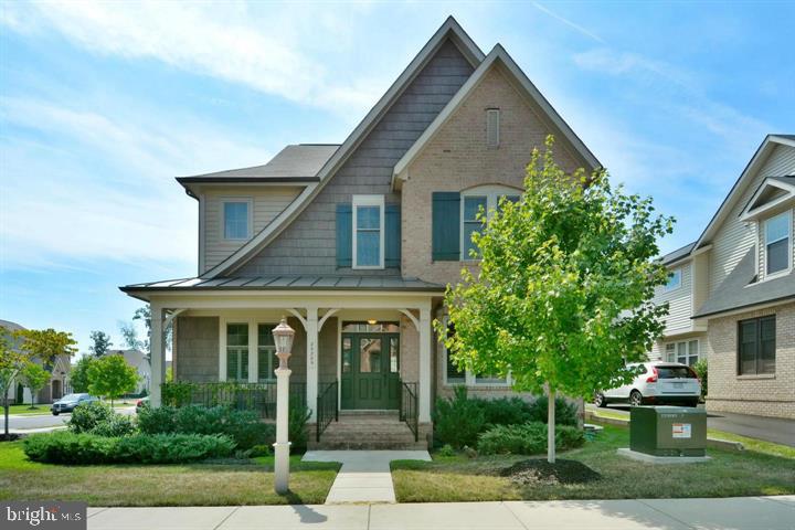 Beautifully maintained 5-bedroom home on a premium corner lot in a quiet cul-de-sac in the heart of Brambleton! This light-filled home offers an open floor plan with hardwood floors throughout the main level, brand-new carpet in the bedrooms, and numerous recent updates, making it truly move-in ready. The upper level features four spacious bedrooms, including an updated owner's suite with high ceilings, custom window treatments, and a beautifully appointed en-suite bath.The gourmet kitchen opens to the spacious family room with a gas fireplace, creating the perfect space for everyday living and entertaining. Recent improvements include a new roof, new HVAC system, new hot water heater, updated kitchen appliances, brand-new carpet, and custom finishes in the dining room and home office. The custom built-ins in the dining room add both character and functionality.The finished lower level is an entertainer's dream, featuring a spacious recreation room, a custom bar with beverage refrigerators and a two-tap kegerator, a dedicated theater room with projector and screen, a fifth bedroom, and a full bath—ideal for guests or multi-generational living.Step outside to the fully fenced backyard featuring a brand-new concrete patio, outdoor fireplace, and plenty of space to relax, entertain, or play. The spacious two-car garage offers ample room for parking and storage.Ideally located just minutes from Brambleton Town Center, shopping, restaurants, parks, trails, and top-rated Loudoun County schools. Convenient to the Ashburn Metro Station (approximately 10 minutes), Dulles International Airport (approximately 15 minutes), Route 28, the Dulles Greenway, and Loudoun County Parkway. Enjoy all of Brambleton's exceptional amenities, including pools, parks, walking trails, playgrounds, and Verizon FiOS internet and cable included in the HOA.This is a rare opportunity to own a beautifully updated home on one of Brambleton's most desirable lots!