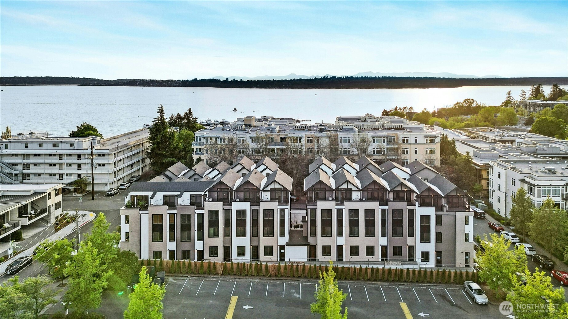 A boutique collection of modern residences just a few blocks from Lake Washington. With an impressive 91 WalkScore, this is Kirkland living at its finest. Stroll to upscale restaurants, vibrant parks, buzzing farmers’ markets, the beloved PCC Market, + the sparkling waterfront—all just moments from your front door. The Mountain Home floor plan offers three serene bedrooms, each with a private ensuite, a pristine chef’s kitchen with luxury finishes, a spacious laundry room + multiple inviting spaces designed for effortless living + entertaining. Secure parking adds privacy, convenience + peace of mind. Elevated design. Unbeatable location. Effortless lifestyle. Welcome to Jackson & Elm.