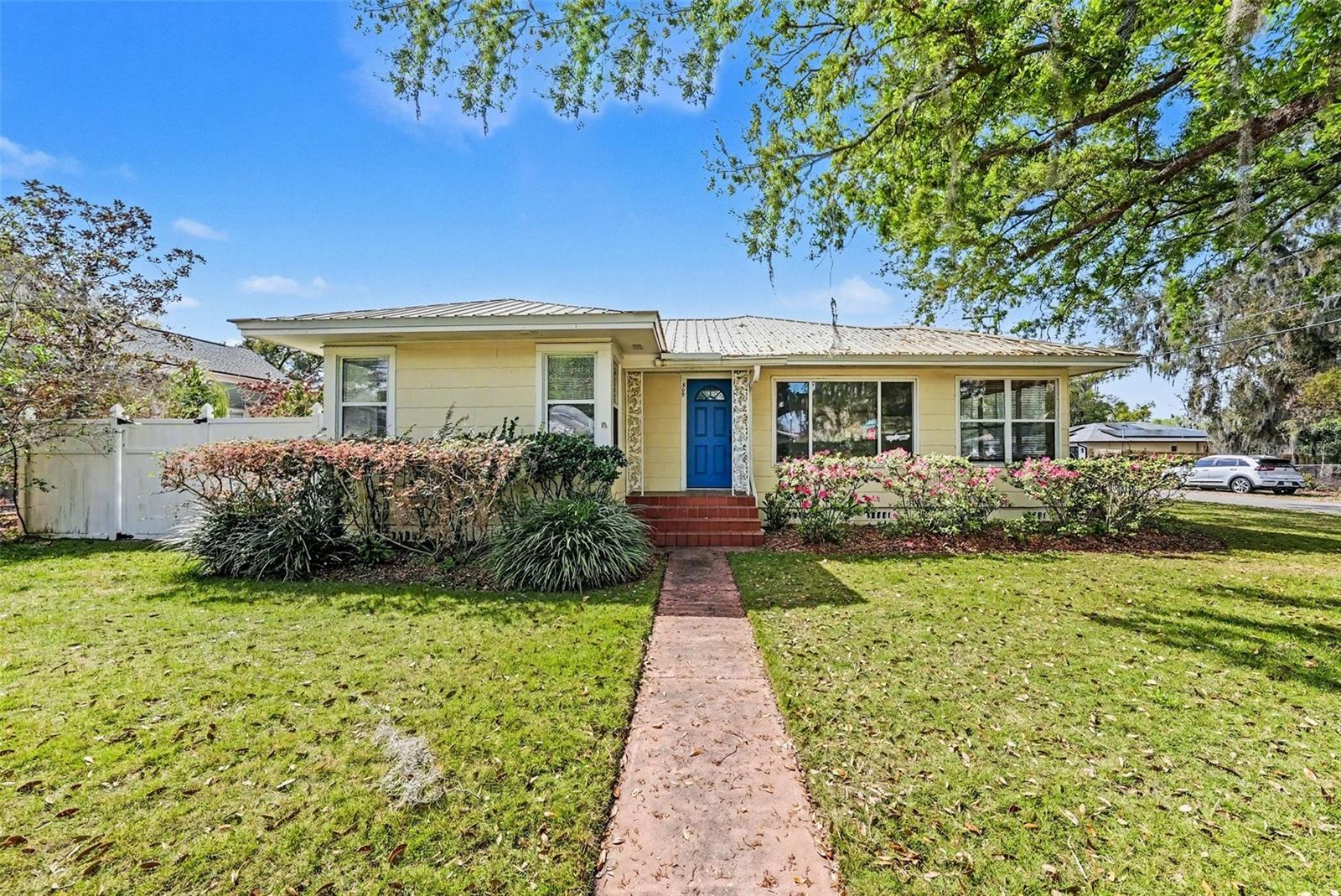 One or more photo(s) has been virtually staged. Located in the charming Historic District of Plant City, this beautifully maintained 2-bedroom, 2-bath home blends timeless character with thoughtful modern upgrades. A versatile bonus room offers the flexibility to serve as a home office, computer room, or comfortable guest space, making it especially appealing for remote workers or anyone needing extra room.From the moment you arrive, the home’s inviting curb appeal and spacious grassy corner lot set the tone. Two welcoming front porches create the perfect place to relax with a morning coffee, while the screened back porch offers a peaceful space to unwind or entertain. There is plenty of outdoor room for pets, gardening, or simply enjoying Florida’s sunshine.Inside, the home maintains its historic charm while benefiting from important updates that add comfort and efficiency. A durable metal roof installed in 2021, updated plumbing in 2022, and double-pane windows help provide peace of mind. Energy efficiency is a standout feature thanks to the 16-panel solar system with an upgraded electrical panel installed in 2022, helping keep electric costs low.The property also includes a convenient carport and two outdoor storage sheds, perfect for lawn equipment, tools, or additional storage. Best of all, there is no HOA and no rental restrictions, offering flexibility for homeowners and investors alike.This move-in-ready home is ideally located just minutes from the vibrant shops and restaurants of downtown Plant City and close to the beloved Florida Strawberry Festival. With easy access to I-4, commuting to nearby cities and attractions such as Walt Disney World and Busch Gardens Tampa Bay is simple, while Florida’s beautiful Gulf Coast beaches are only a short drive away.Full of charm, thoughtful updates, and an unbeatable location, this delightful Plant City home offers comfort, character, and convenience all in one.