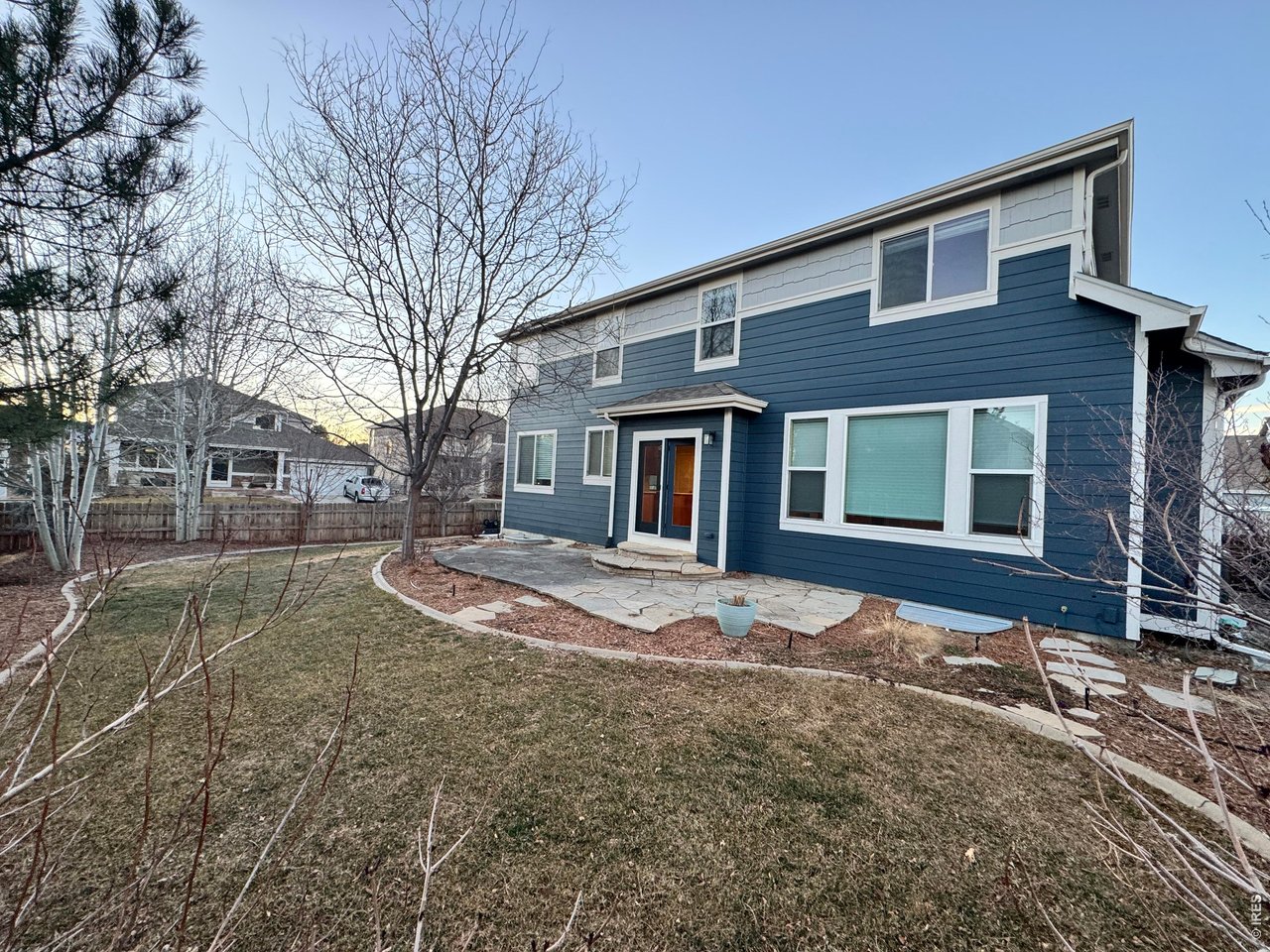 Welcome to this elegant 2-story home in Westchase, one of South Fort Collins' most desirable neighborhoods, served by highly regarded Bacon Elementary, Preston Middle School, and Fossil Ridge High School. Set on a corner lot with a fully fenced yard, this home offers timeless style, generous living spaces, and outstanding functionality. Inside you'll find a dramatic staircase, formal living and dining rooms, a spacious family room, a large kitchen with an island, and a main floor office that can easily function as a 4th bedroom. Upstairs includes 3 bedrooms, a versatile loft, and a spacious primary retreat with a 5-piece bath, soaking tub, and walk-in closet. Bedrooms 2 and 3 share a Jack-and-Jill bath. Brand new carpet and newly refinished hardwood floors make this home move-in ready, while the unfinished basement offers future expansion opportunities. Additional improvements include a Class 4 roof (2019), water heater (2019), and a new furnace and A/C (2025). The property has been pre-inspected, the sewer line scoped, roof inspected and radon tested for added peace of mind and buyer confidence.