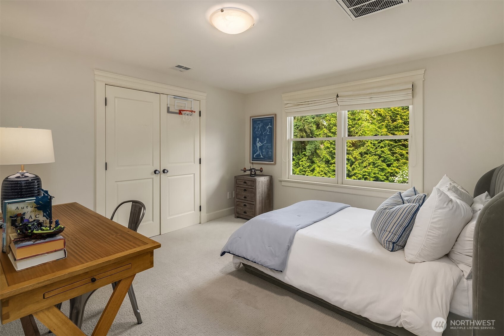 Upper bedroom with build-in closet doors