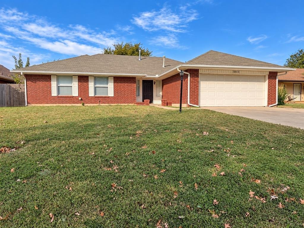Spacious 4-bedroom home offering a functional floor plan with plenty of room to spread out! Conveniently located just outside Tinker Air Force Base, with easy access to shopping, dining, and major highways. The large living room features a cozy fireplace, while an additional open living area leads to a fully enclosed sunroom, providing flexible space for entertaining or relaxing. The kitchen offers granite countertops, abundant cabinet storage, and generous counter space. Both bathrooms feature fully tiled showers, and all four bedrooms are generously sized. A storm shelter located in the garage floor provides added peace of mind.