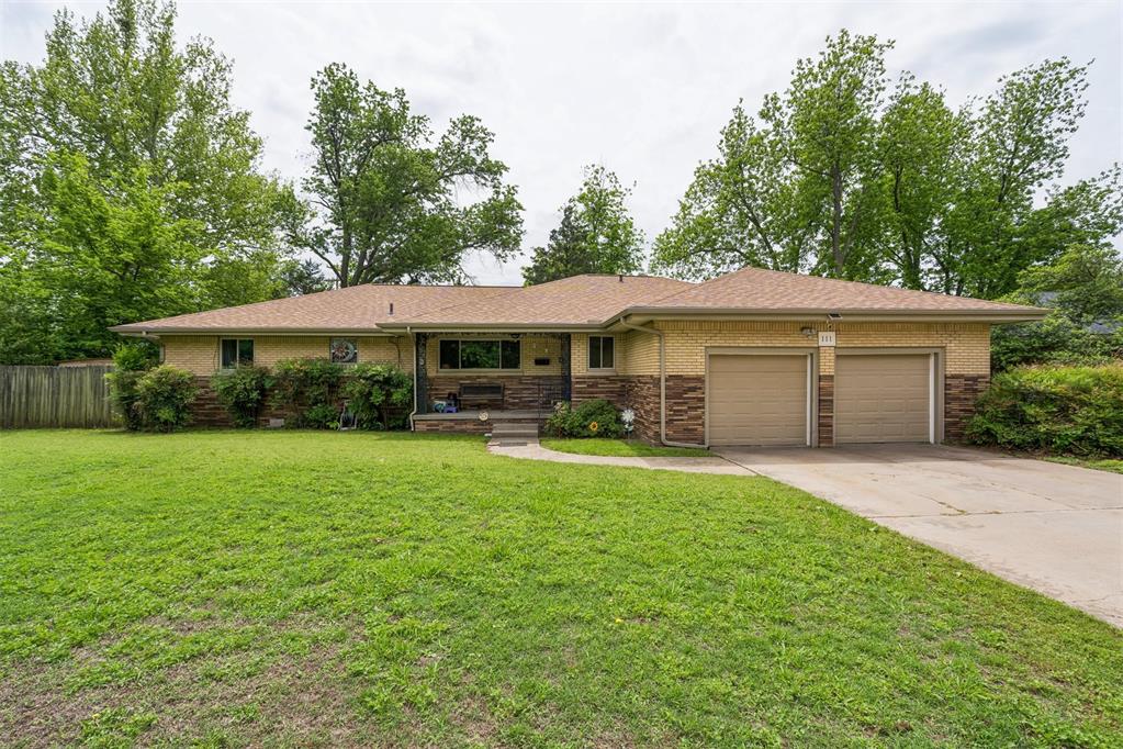 ***MOTIVATED SELLER has REDUCED the PRICE*** on this charming home situated on nearly 1/3 of an acre in NORMAN!  From the moment you step inside, you’ll appreciate the spacious living room featuring beautiful hardwood floors that flow seamlessly into the dining area. The kitchen is full of original charm with timeless wood cabinetry, stainless steel appliances, and unique character you won’t find just anywhere.This versatile floor plan also includes a large second living area that could easily serve as an additional bedroom, game room, or flex space to fit your needs. The beautifully remodeled hall bathroom is a true standout, showcasing elegant marble finishes and a stunning oversized shower. The primary bedroom offers hardwood floors and generous space, while the additional bedrooms are comfortably sized and full of natural light.Major updates include: a new roof, new HVAC system, new siding, new sewer line, new water line, new guttering, new front door, new back double door, and new Champion windows. The spacious utility room features built-in cabinetry and leads directly to the two-car garage for added convenience.Step outside to enjoy the gorgeous backyard, complete with a beautiful deck, privacy fence, storage building for lawn equipment, and your very own Jacuzzi tub! Conveniently located close to shopping, just minutes from the University of Oklahoma, and near all the excitement of Boomer Sooner country, this home offers the perfect blend of charm, updates, and location. Don’t miss your opportunity to make this special home your own!