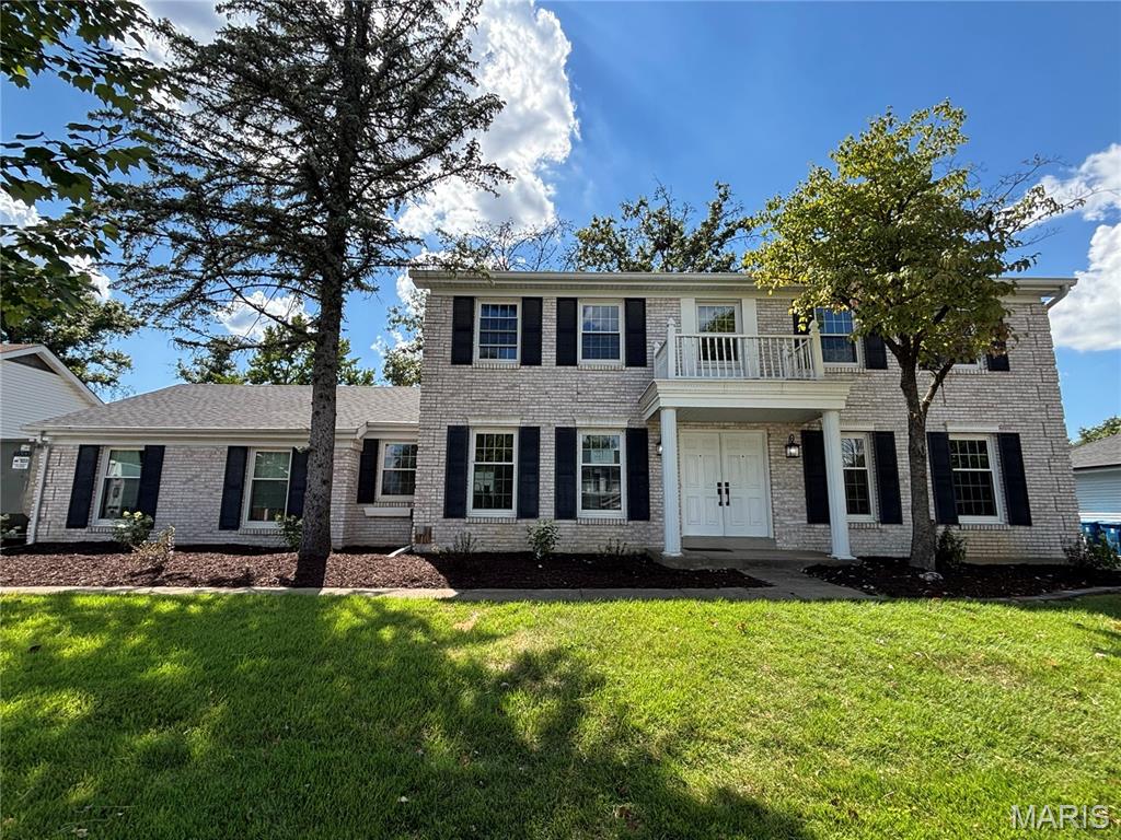 Showings start 9/24. Professional pictures 9/17. You DO NOT want to miss out on this stunning Chesterfield home! 1917 Dovercliff Ct offers 3,302 square feet of living area, four bedrooms, four bathrooms, and a FINISHED LOWER LEVEL. The kitchen is unbelievable! Quartz countertops, soft-close cabinets, ceramic backsplash, Blanco sink, and stainless-steel appliances. The fridge stays! The family room includes a wood burning fireplace and bar area. The main level also contains a formal dining room, living room, powder room, and main floor laundry. Upstairs there are four bedrooms and two full bathrooms. The generous sized primary bedroom provides a walk-in closet and an ensuite bathroom. The bathrooms contain ceramic tile shower surrounds with modern matte black shower fixtures. The finished lower level adds valuable living space and a convenient full bathroom. The entire home boasts beautiful new LVP flooring, upgraded baseboards, and modern matte black light fixtures and door hardware. Keep your cars dry in the attached two car rear entry garage. The backyard is freshly landscaped and the patio is perfect for your morning coffee. The classic brick exterior adds to the stunning curb appeal. Additional upgrades include a 200 amp electric panel. Ideally located just minutes from Target, HomeGoods, shopping, dining, and everyday conveniences. 1917 Dovercliff Ct combines luxury, style, and an unbeatable location. Schedule your private showing today and experience everything this exceptional home has to offer.
