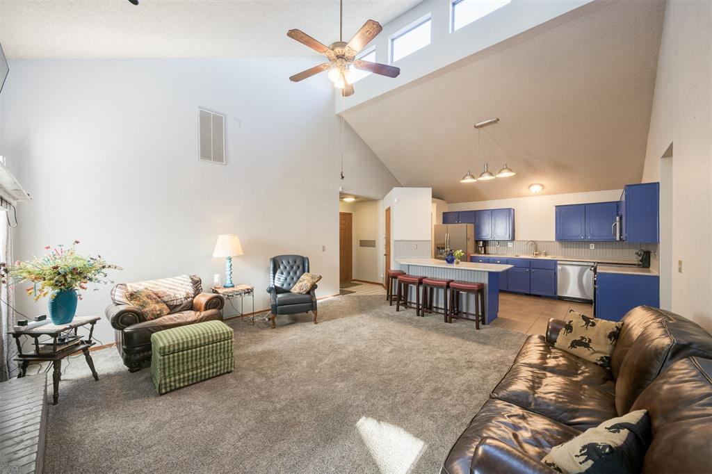 Welcome to 2512 Lee Lane, a move-in ready 2-bedroom, 2-bath home tucked in a quiet cul-de-sac in Oklahoma City. This charming brick property offers 1,179 square feet of well-planned living space with thoughtful upgrades and inviting features.

Step inside to find a bright and airy living room with soaring double-height ceilings, lots of windows windows, and a cozy fireplace. The open-concept layout flows seamlessly into the kitchen, featuring stainless steel appliances, ample cabinet space, and a large island with bar seating.

The primary suite provides generous space with vaulted ceilings, a walk-in closet, and a private bath. A second bedroom and full bath offer flexibility for guests, home office, or hobbies.

Energy efficiency is a highlight here with a new water heater, roof replacement in 2019, and solar panels, which all keep utility costs low while offering peace of mind.

Outside, enjoy the covered patio, fenced backyard, and mature trees that create a private setting for relaxing or entertaining. The attached garage adds convenience and storage.

Located in an established neighborhood with easy access to shopping, dining, and major highways, this home blends comfort, efficiency, and value.