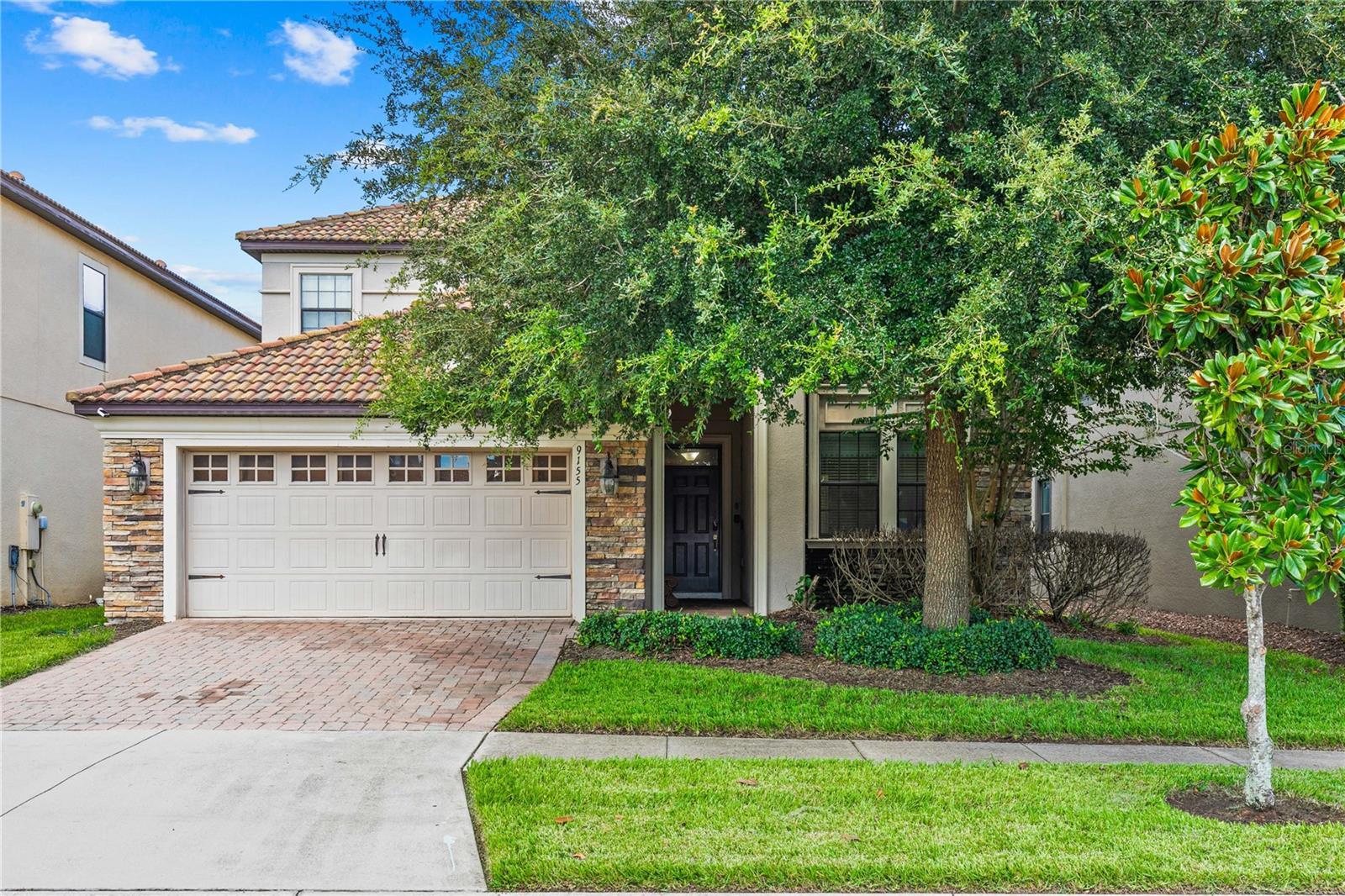 Welcome to a six-bedroom, six-bath pool home in the gated community of The Retreat at ChampionsGate. Designed for gathering, the open living and dining areas flow into an updated kitchen with modern appliances, generous cabinet space and a breakfast bar. The dining area seats eight, with additional bar seating for four. A pool table lounge offers another inviting space to relax and entertain.Step outside to the screened private pool and spa, where you can enjoy sunny afternoons and evenings with guests. Owners and guests also have access to the Oasis and Retreat clubhouses, with resort-style pools, water slides, a lazy river, dining, a tiki bar, mini golf, an arcade and a fitness center. With six bedrooms, generous gathering spaces and resort amenities close by, this home offers flexibility as a primary residence, Florida getaway or short-term rental opportunity, subject to applicable requirements. Schedule your private showing and experience the ChampionsGate lifestyle.