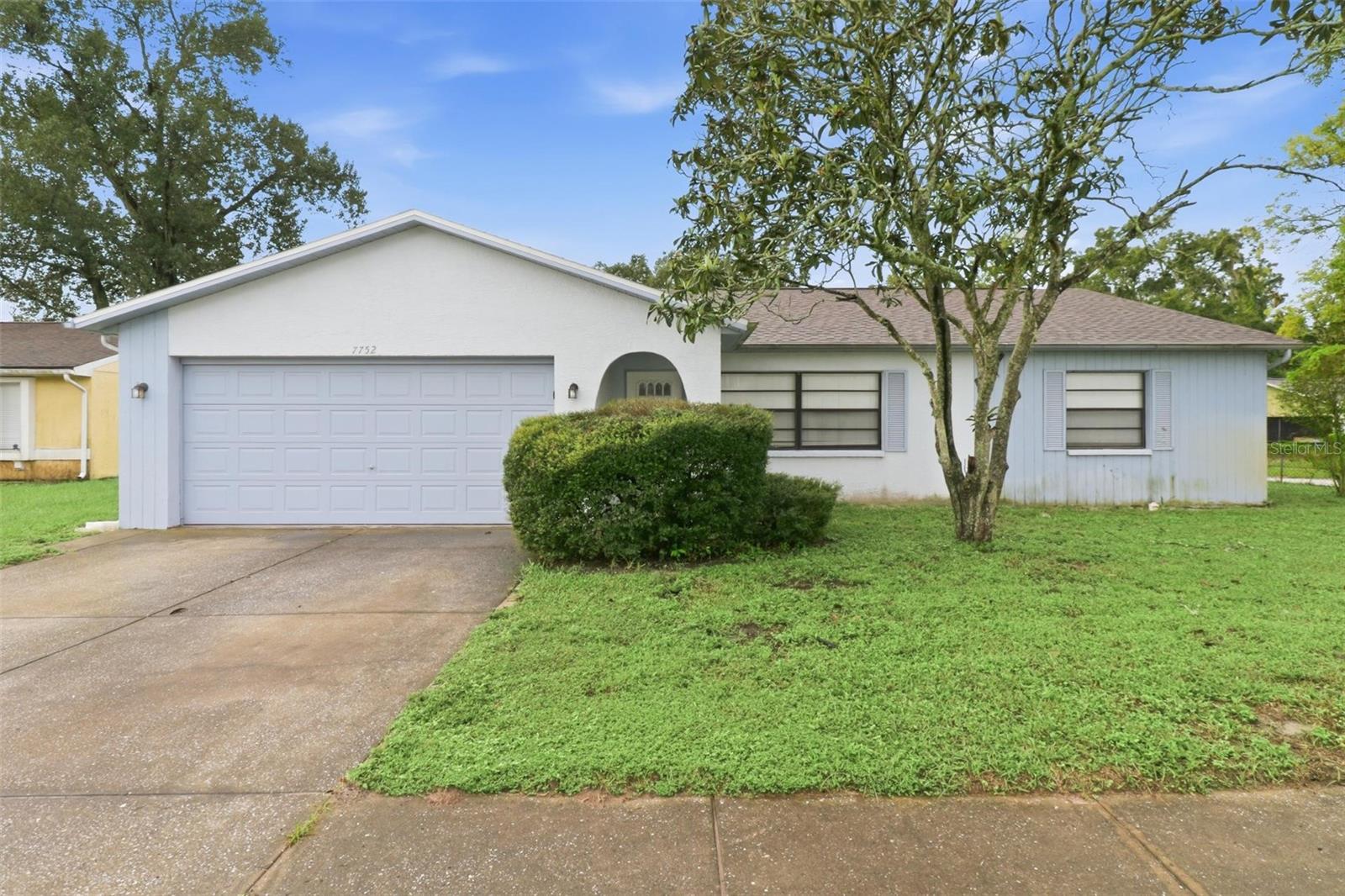 Charm and curb appeal abound for this New Port Richey home! Step inside the well-appointed living room and into the kitchen, which boasts a 4-piece appliances package, hard surface countertops, and ample storage. This ranch style floorplan is rounded out by the family room, primary suite, and two secondary bedrooms. Come and see for yourself the possibilities that this home has to offer!