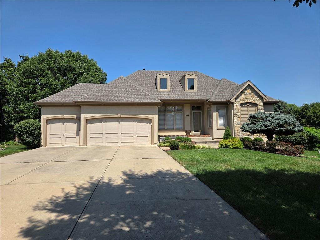 Rare opportunity to own this lovingly maintained, original-owner reverse 1.5-story in the highly sought-after Wheatley subdivision! This maintenance provided home is nestled on one of the best lots in the neighborhood—nearly a half-acre cul-de-sac location, backing to trees and Kensington Park for incredible privacy and views. The main level features a spacious living room, formal dining room, large kitchen with island and breakfast area, a cozy hearth room with fireplace, primary suite, second bedroom and full bath, plus laundry room. The finished walkup/walkout lower level offers abundant daylight, a large family room with wet bar and stone fireplace, two oversized bedrooms, a full bath, and massive unfinished area for storage. Plus 3-car garage, 1-year-old roof, newer AC and freshly stained deck! Seller is offering 1-year home warranty with acceptable offer. Selling as-is; inspections welcome.
