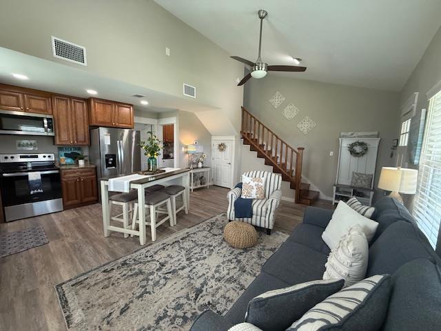 Nestled in the waterfront community of Holiday Beach, this property offers privacy and relaxing coastal living ~ Cozy covered front porch ~ Step inside to an inviting open-concept living space, where windows bathe the home in natural light ~ The cheerful kitchen boasts stainless steel appliances and granite countertops ~ Perfect open layout for entertaining friends and family ~ Main level primary suite with full bath, two closets and private entrance to the backyard ~ Laundry room with half bath ~ Two additional bedrooms plus full bath are located on the second level ~ Enjoy direct access to world-class fishing, boating, dolphin watching and gorgeous sunsets ~ Whether you're unwinding on the covered porch or hosting guests in the outdoor space, every moment here feels like a vacation ~ Amenities include 2 boat ramps, fishing pier, kayak park, community pool and community center ~ Located just minutes from Rockport's vibrant dining, shopping, and art scene ~ Most furnishings convey