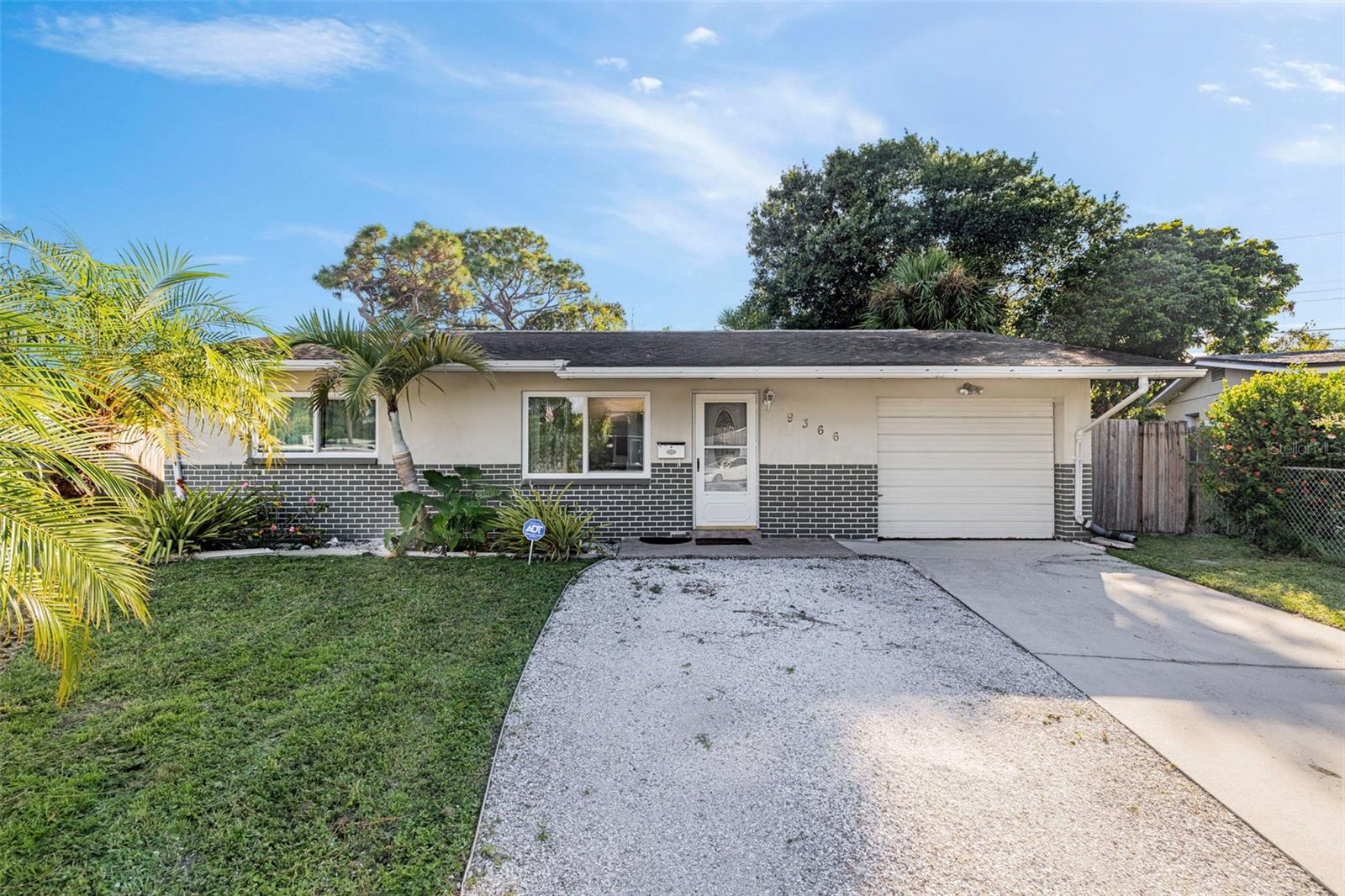 Nestled in the heart of Pinellas Park, this move-in ready 2-bedroom, 2-bathroom block home offers the perfect blend of modern updates, versatile living spaces, and an unbeatable location. Whether you’re a first-time buyer or simply looking for a home with room to grow, this property delivers comfort, charm, and functionality.
Step inside to find an open floor plan with an updated kitchen as the centerpiece, featuring sealed travertine countertops, stainless steel appliances, and a breakfast bar for casual dining. A dining room just off the kitchen provides flexibility for family gatherings, hosting events and entertaining. 
The thoughtful split floor plan includes a spacious primary suite with tile flooring, an en-suite bath, and a generous sized closet, while the guest bedroom also offers plenty of square footage and the second bathroom showcases a charming double sink vanity and walk in shower. Additional conveniences include an indoor laundry located in the garage with washer/dryer hook-up and extra storage.
Outside, the oversized fenced backyard (nearly 1/4 acre!) is a true highlight, complete with two sheds for storage and space for a garden, a pool and just enough room to park your boat! 
Major updates ensure peace of mind, including newer windows (2025), new sliding door (2025), new AC (2023), newer water heater (2019). 
Located just minutes from Skyview Recreation Center, local restaurants, shopping, and with easy access to US-19, I-275, Park Blvd, and Bryan Dairy, you’ll enjoy a short drive to Downtown St. Pete, Tampa, and the world-famous beaches.
This unique property is a rare find—offering updates, space, and flexibility in a prime location. Schedule your showing today and discover all the possibilities this home has to offer!