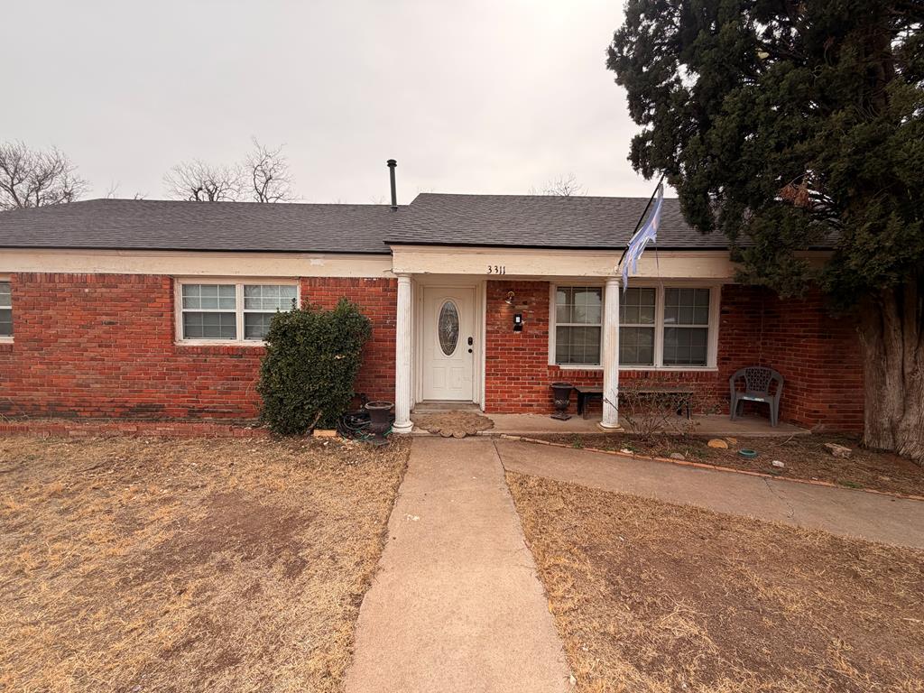 Huge lot with so much potential to create an outdoor oasis. Spacious open living and dining area. Durable tile flooring throughout main spaces, functional kitchen with ample cabinetry, and a cozy brick fireplace. Generous bedrooms, abundant natural light, and a practical layout make this a solid rental property or an amazing fixer upper.