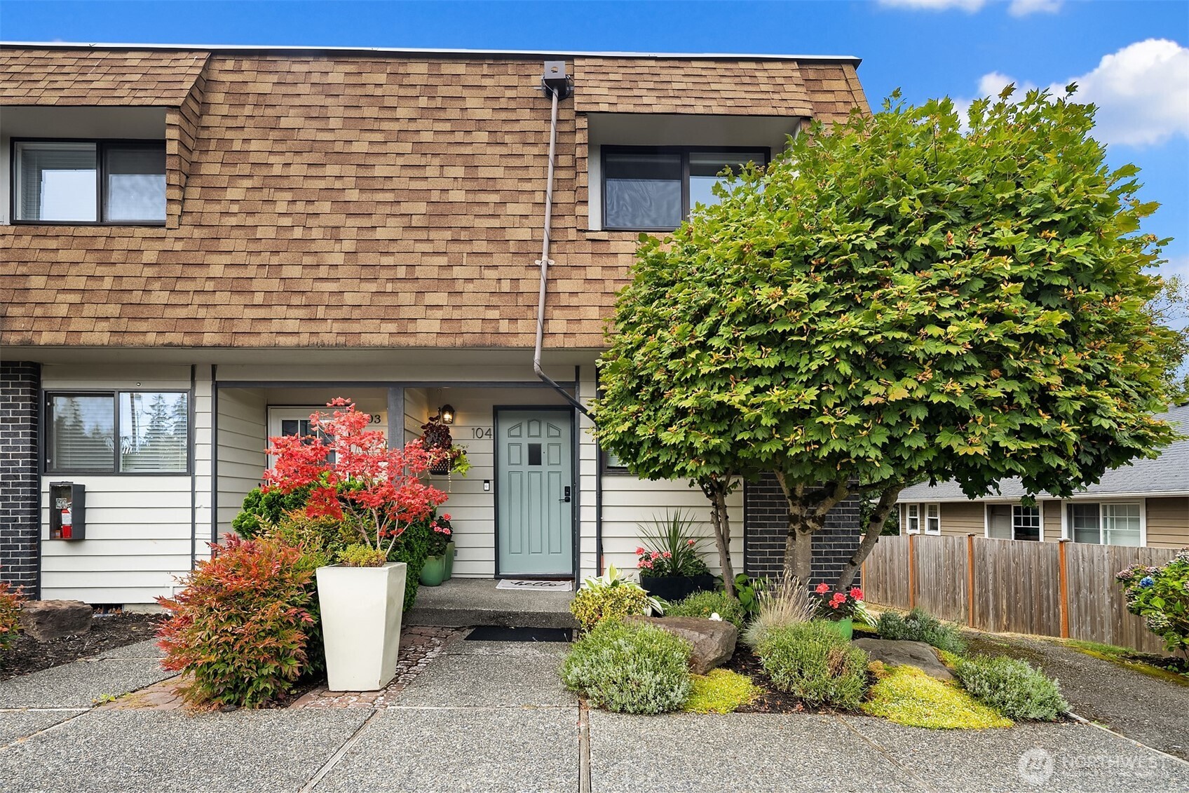 Darling and completely updated, this 2-bedroom, 1.5-bath end-unit townhome offers an easy, move-in-ready lifestyle with thoughtful updates throughout. New laminate flooring creates a clean, modern feel, while the stylish updated kitchen opens to a light-filled living space with built-in shelving, quartz countertops and newer appliances. A fully fenced private backyard gives you your own outdoor space for morning coffee, entertaining or unwinding at the end of the day. Upstairs, two comfortable bedrooms are joined by a versatile bonus room, perfect for a home office, nursery, hobby space or extra storage. Beautifully updated baths, a large main-floor laundry room and additional storage throughout make excellent use of every square foot. Two assigned parking spaces, great natural light and low HOA dues add even more value, all within a small complex. And the location is hard to beat... moments from Edmonds College, walkable to Swedish Hospital, Five Corners coffee shops and restaurants, Yost Park, Pine Ridge Park and nearby dog parks, with Downtown Edmonds just minutes away. Stylish, functional and wonderfully connected to everything Edmonds has to offer.