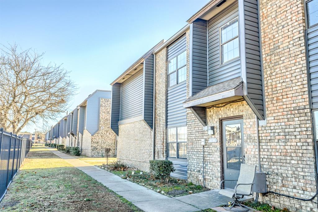 Attention investors and first-time buyers! This charming 2-bedroom, 1.5-bath condo in the heart of Cottonwood Ridge offers the perfect combination of location and value. Updated Paint, flooring, and window treatments, make it feel brand new.  Nestled on the upper level for added privacy, Unit #160 features a cozy masonry fireplace(works, just coverred), recently updated durable laminate flooring throughout, and bedrooms flooded with natural light and bright walls. The complex amenities are second to none, featuring a community pool, tennis courts, a dog park, and reserved parking. Perfectly situated near local dining, shopping, and campus, this unit is a proven winner for a rental portfolio or a student seeking a quiet study haven. Roof replaced in 2025!