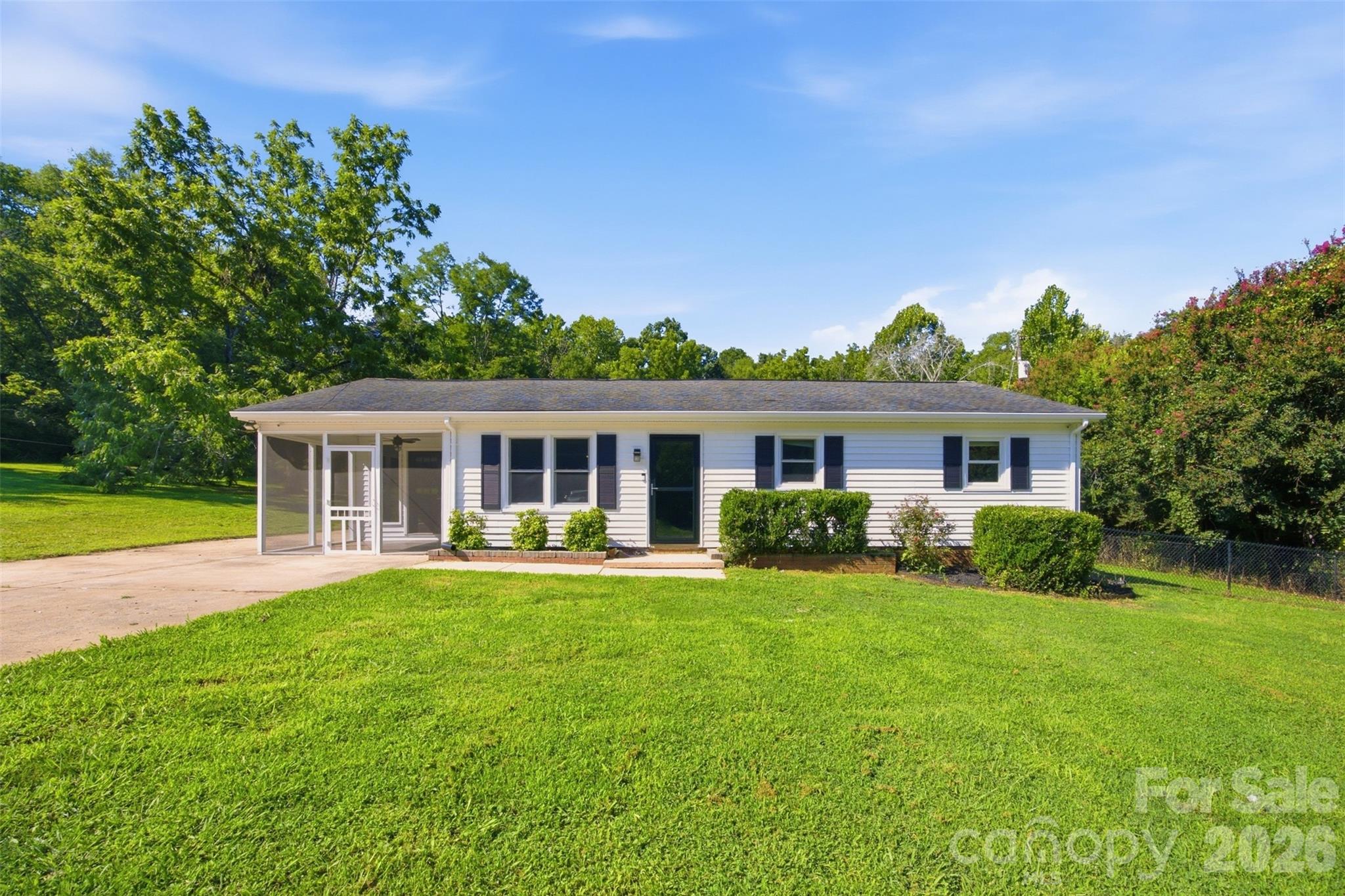 Opportunities like this don't come around too often in Mount Pleasant! This .9 acre cleared and flat lot will give you the privacy and country feel you're wanting, yet you're only a two minute drive to downtown restaurants. While it is located on Hwy 73, the home is set far back from the road and there are privacy trees at the front of the property. 24x24 workshop in the back with electricity, utility sink, and a 12 ft roll up door. The home itself is 3 bedrooms plus a great flex space, offering endless possibilities. LVP flooring throughout with ceramic tile in the kitchen. Primary bath features a ceramic tile shower, while the other full bath has a tub/shower combo with a large vanity. All bedrooms have ceiling fans. Kitchen provides plenty of cabinets, pantry, and stainless steel appliances. Island counter is not attached, but conveys. Great laundry room setup with cabinets and folding table, which leads to the backyard. Screened porch area in front of home, and partially fenced in back yard. Exterior has been painted. No city taxes and Mount Pleasant schools. This home is exactly what you have been waiting for!!