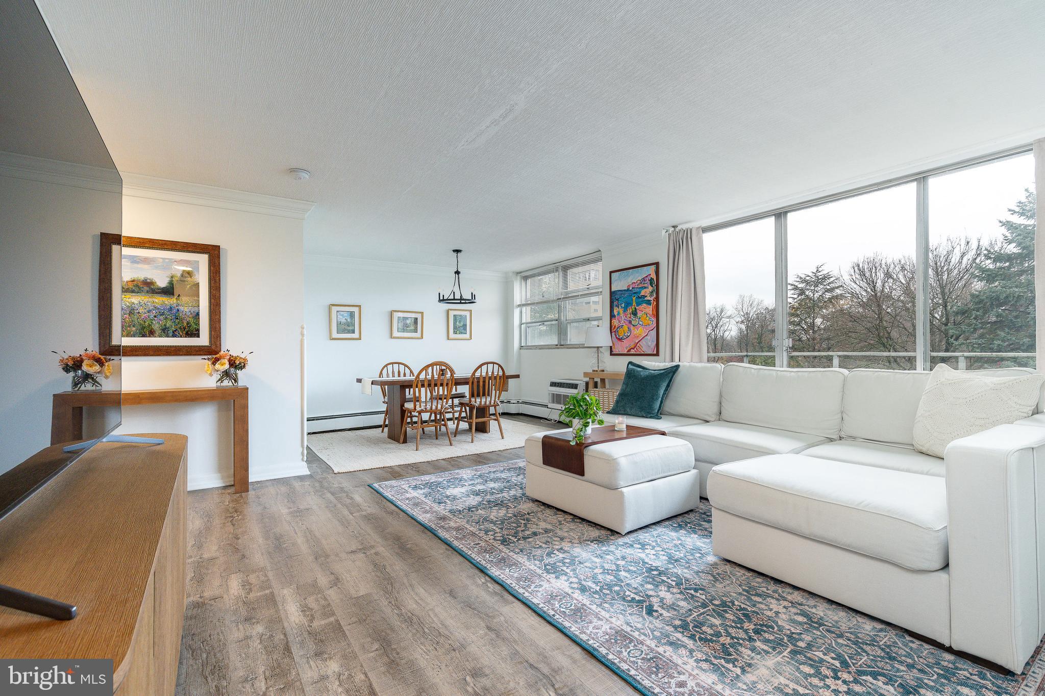 Experience one of the few three-bedroom, two-bath corner residences at The Radnor House, featuring a private balcony and located on one of the pet-friendly floors. Sunlight pours in through oversized windows, illuminating an open layout and tasteful updates throughout. Both the hall and primary suite baths have been beautifully renovated with modern finishes.The kitchen was completely remodeled in 2024 and combines style and function with stainless-steel appliances, gas cooking, quartz-style countertops, and a herringbone tile backsplash, creating a sleek, contemporary look. Crown molding, updated flooring, and fresh paint extend through the main living areas. The spacious living and dining area opens to sliding glass doors and a balcony overlooking landscaped grounds​ - an ideal spot for morning coffee or evening relaxation.  Enjoy New AC Units and New Light fixtures throughout.   Enjoy abundant storage, including a large entry closet, generous bedroom closets, and a private storage unit on the ground level. Laundry facilities are conveniently located in the building. Residents benefit from on-site management, 24/7 security, complimentary outdoor parking, a swimming pool, grilling patio, playground, and access to 27 acres of landscaped property.Located within the Radnor Township School District, this home offers unmatched convenience near Villanova University, Lancaster Avenue shopping and dining, public transportation, and major Main Line employers. The $5​43 monthly condo fee and flat $172 utilities fee simplify ownership​. A rare, move-in-ready opportunity in a highly desirable Main Line community.