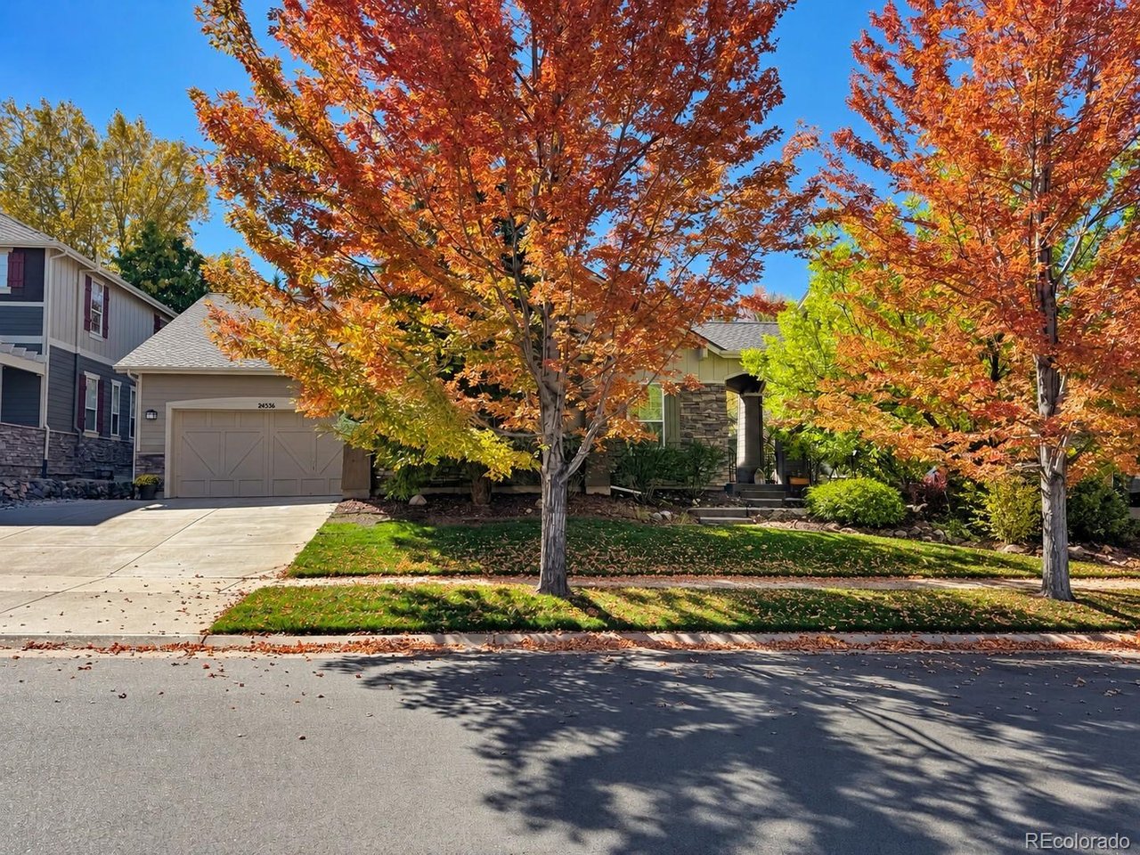 Welcome to this beautiful ranch-style home in Tallyn's Reach, offering nearly 4,100 finished square feet, 3 bedrooms, 4 baths, a finished basement, 3-car garage, and paid-off solar panels. The spacious great room features soaring 10-foot ceilings and a gas fireplace, creating an inviting space for everyday living and entertaining. The kitchen features abundant 42-inch maple cabinetry, a large pantry, leathered granite countertops, stainless steel appliances, and a spacious island with additional seating and prep space. The adjoining breakfast area overlooks the welcoming front courtyard, providing a pleasant setting for casual dining. A main-floor study with built-ins offers flexible space for an office or potential additional bedroom with the addition of a closet. The primary suite features private patio access, a large walk-in closet, and a 5-piece bath with heated floors. A second main-floor bedroom and full bath, also with heated floors, provide additional main-level living space. A powder bath and laundry room with sink and cabinetry complete the main level. The finished basement offers a spacious family/rec room, wet bar with dishwasher, mini fridge and ice maker, plus a projector and projection screen. A versatile bonus area provides additional space for an office, fitness area, hobby room, or game room. A third bedroom and full bath complete the basement. The split 2-car and 1-car garages provide excellent space for vehicles, storage, recreational equipment, or a workshop. Conveniently located near the Tallyn's Reach clubhouse and pool, Southlands, shopping, dining, parks, trails, and everyday amenities.